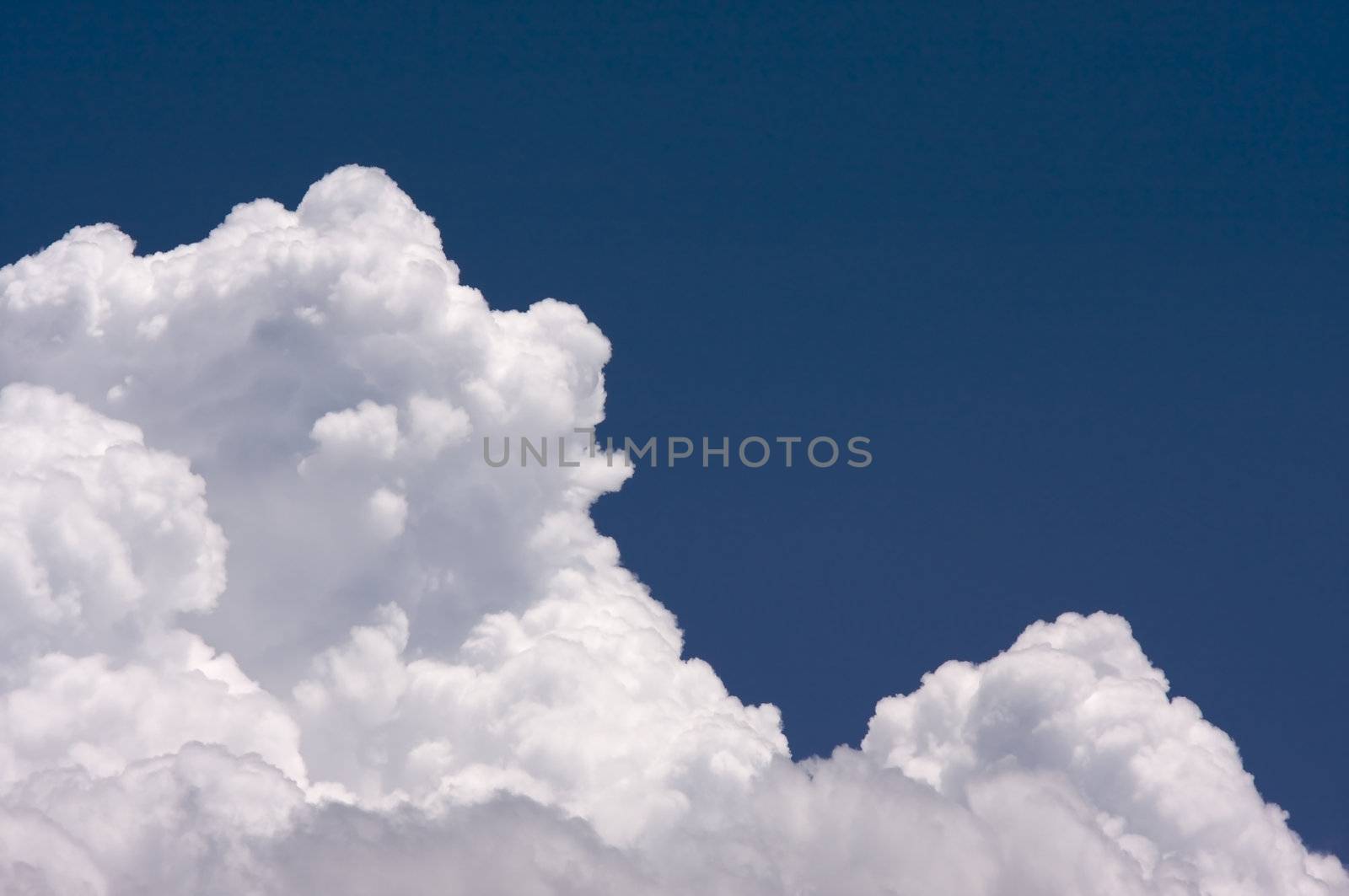 Puffy Clouds on a blue sky.