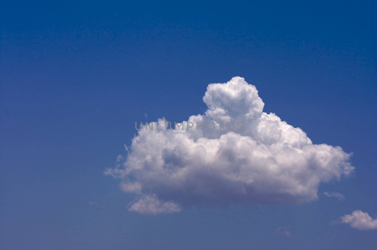 Puffy Clouds on a blue sky.