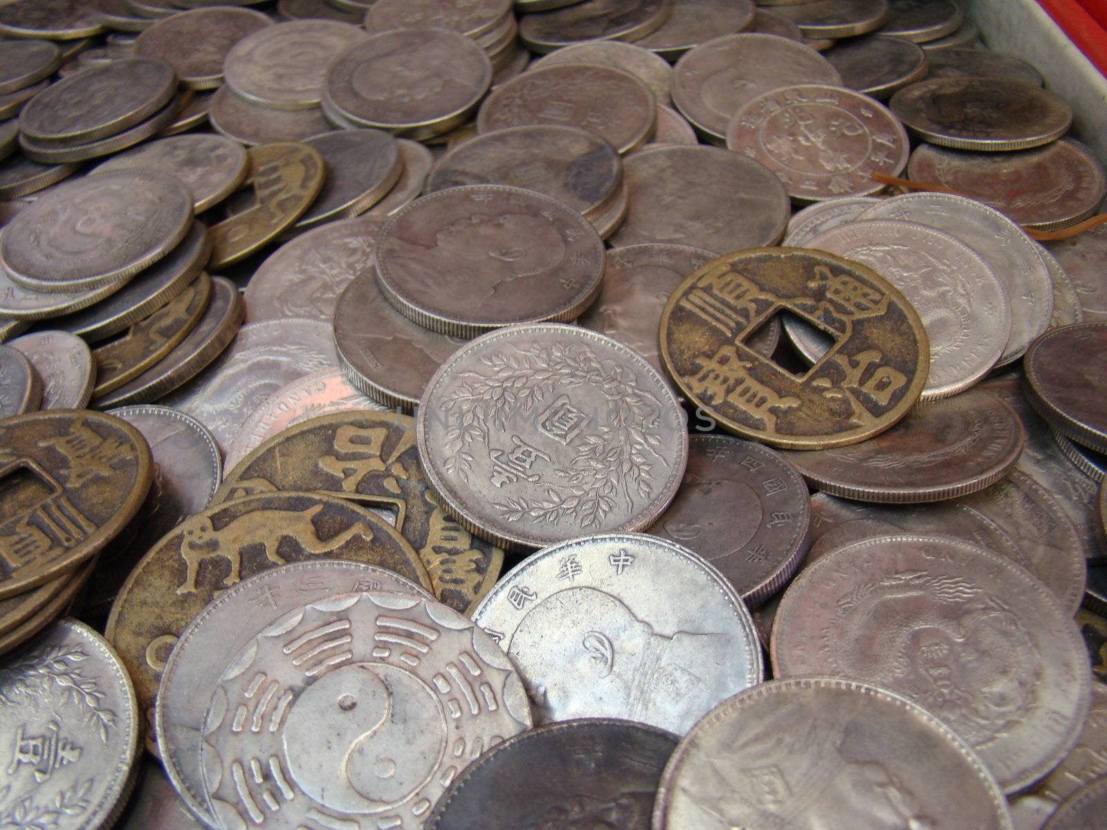 A Variety Of Different Chinese Coins by hicster