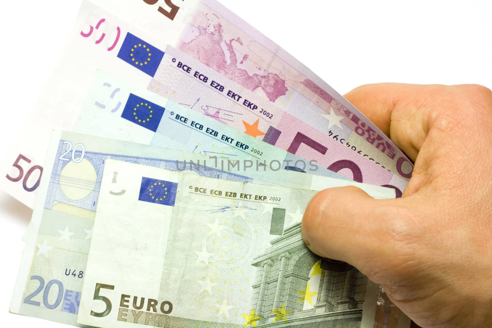 Human hand holding euro banknotes