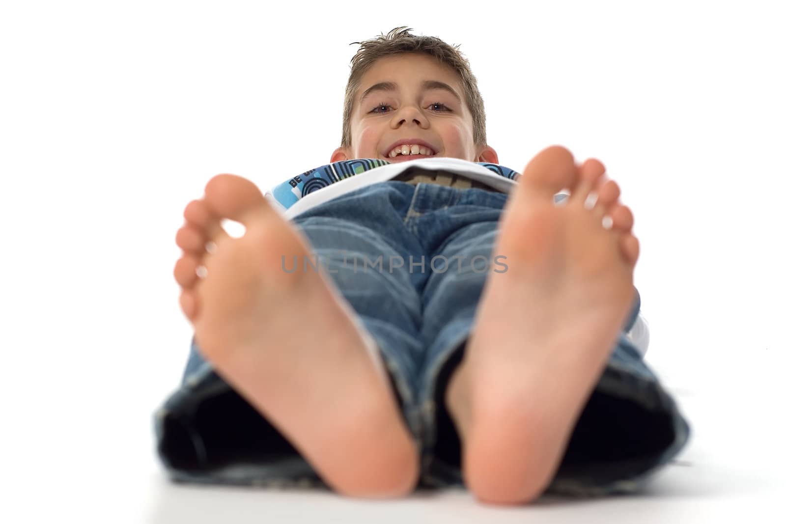a happy boy with (unsharp) big feet