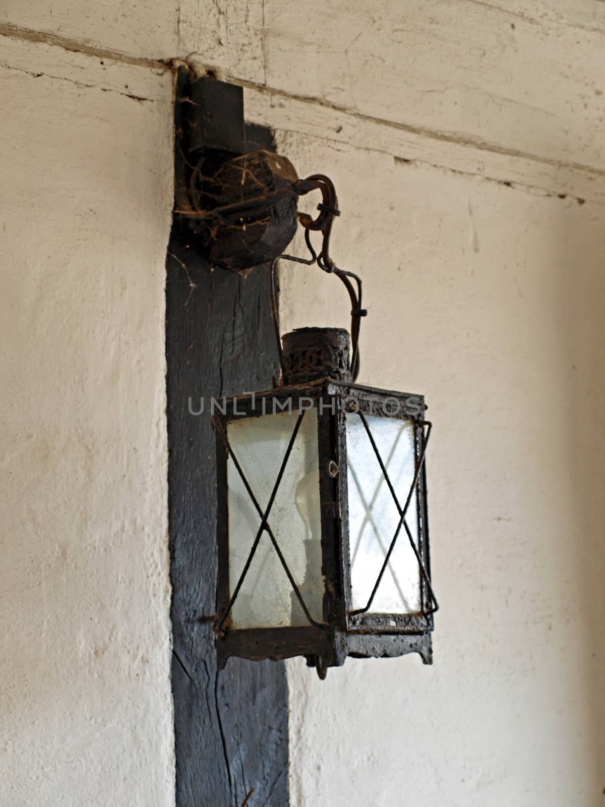 Antique street lamp mounted on a wall Denmark      