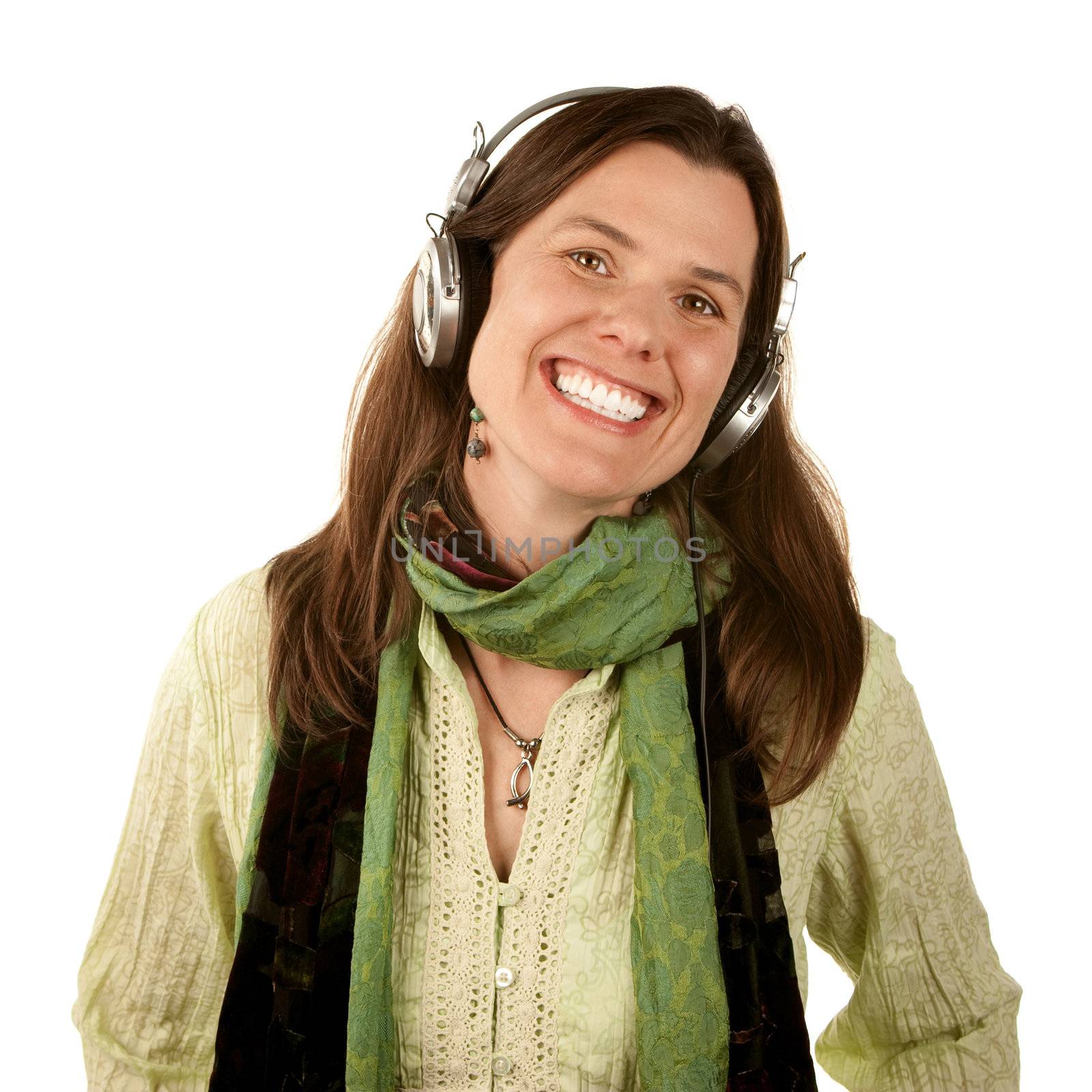 Pretty adult woman on white wearing headphones