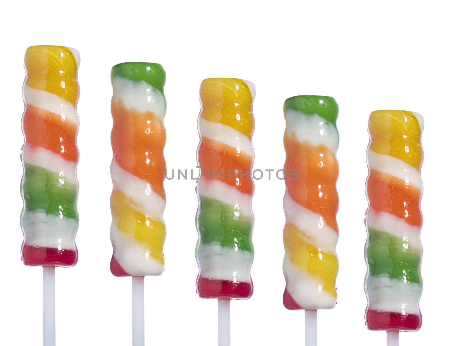Five lollipop sticks isolated over white background.