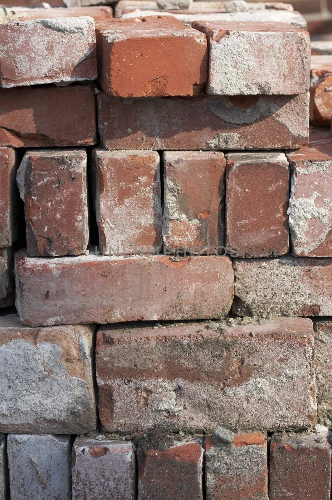 a close up of an old pile of bricks