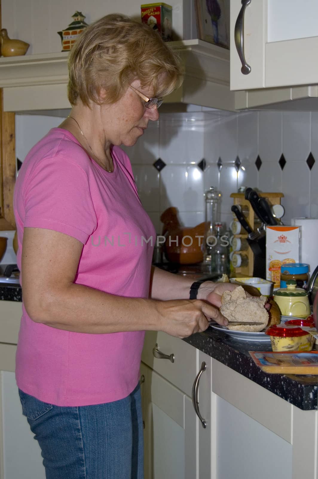 elderly woman is making sandwiches by ladyminnie