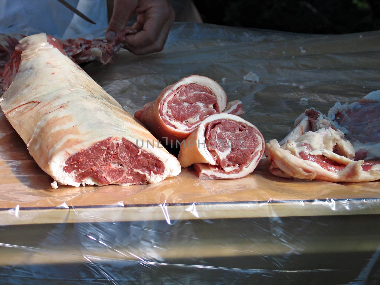 Display of fresh lamb meat cut by a professional butcher