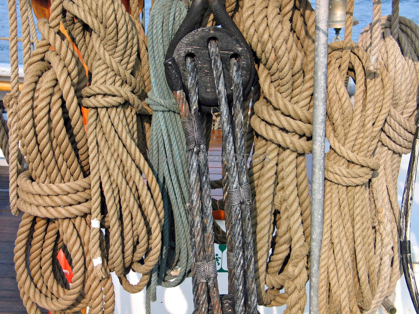 Collection of ropes on an old wooden sail boat