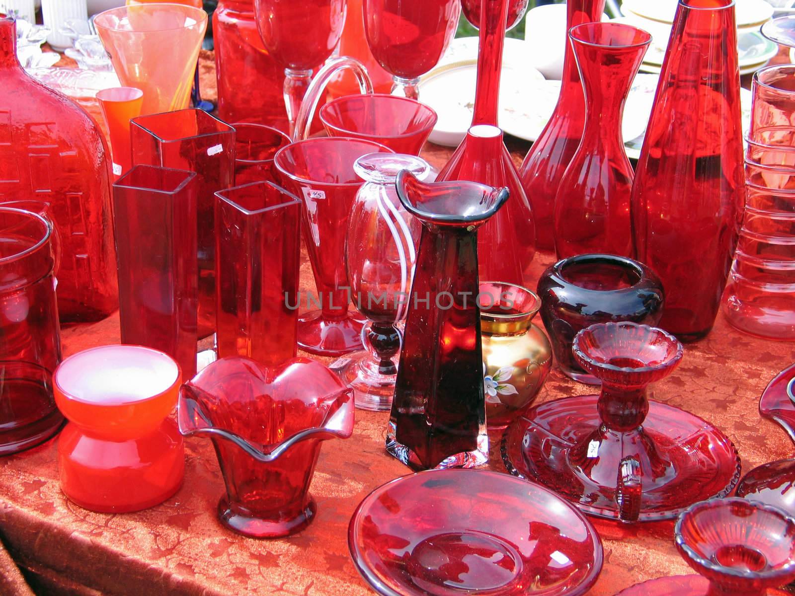 Red glass item in a flea market stand in Denmark