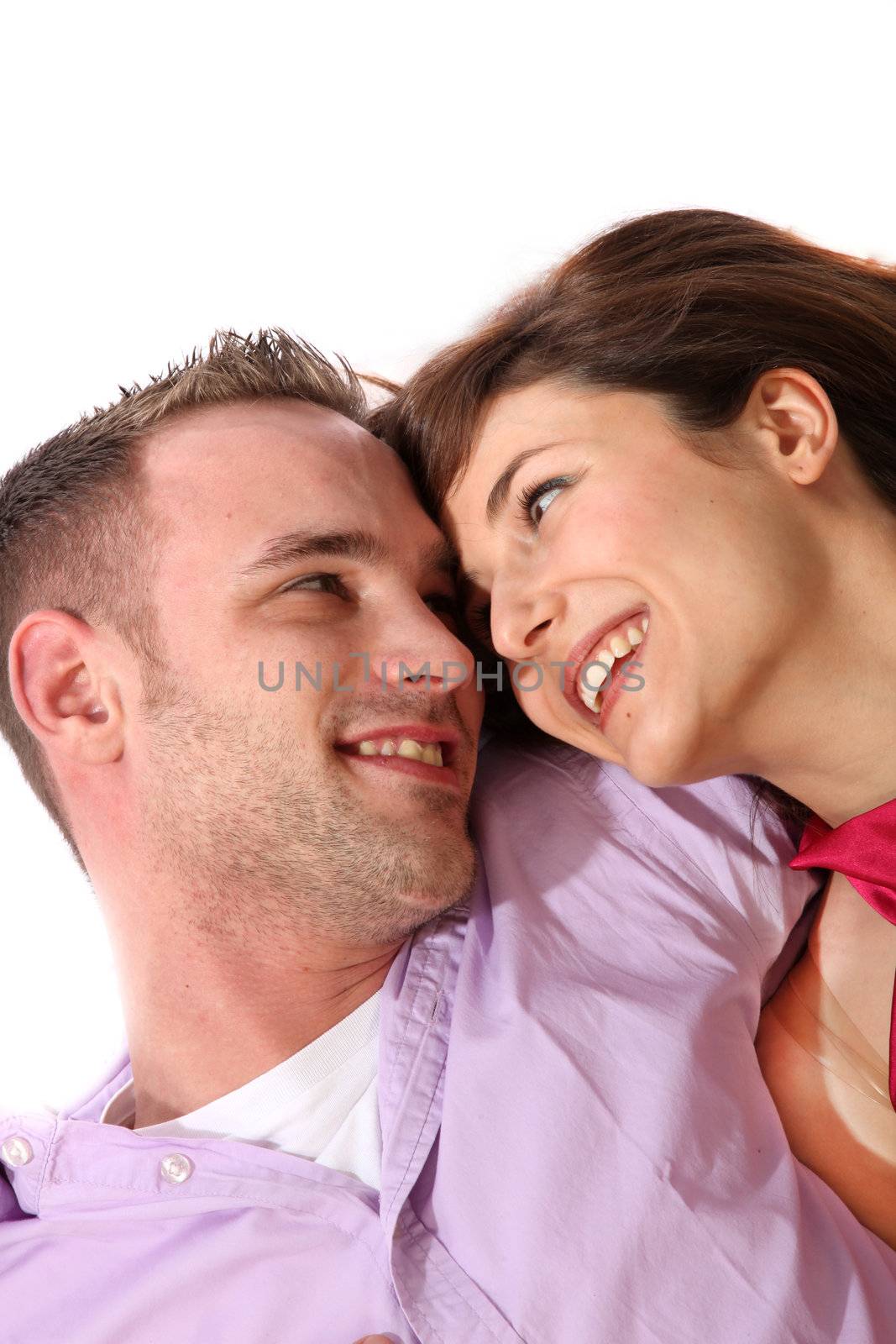 young couple laughing together - space for text