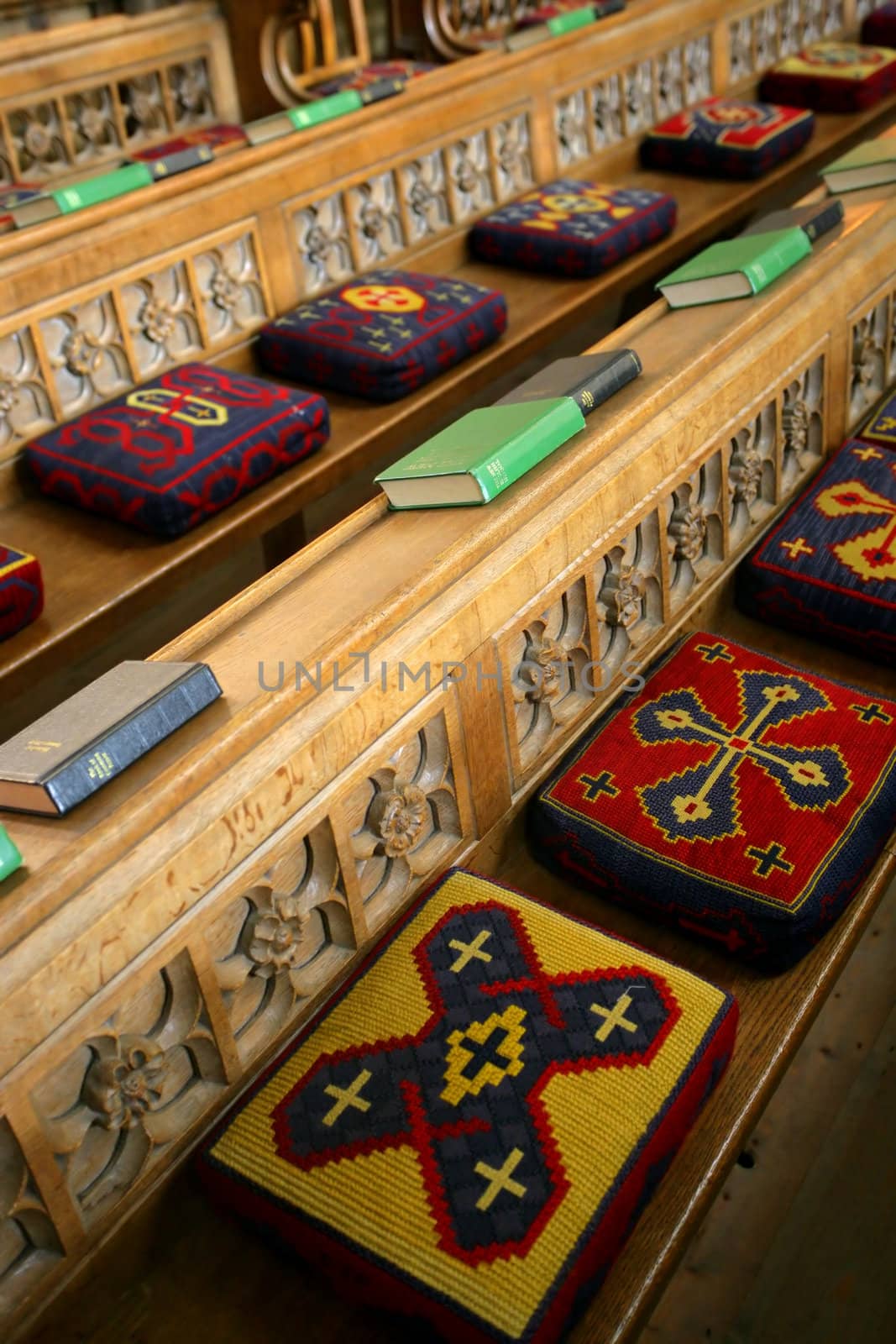 Cushioned pews from a church in England. (Focus is in the middle)
