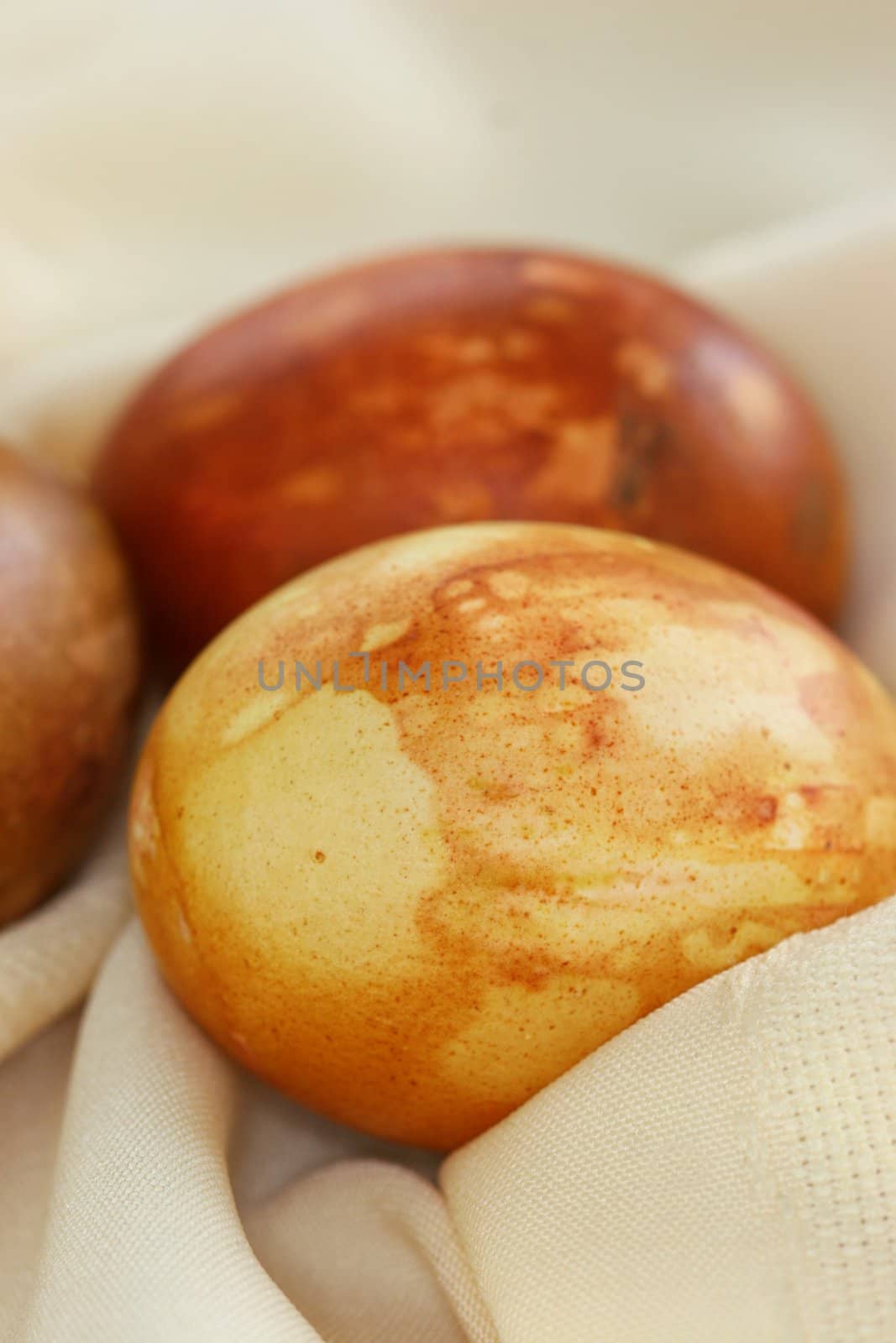 Naturally dyed easter eggs - the eggs are colored with various leaves and flowers such as roses