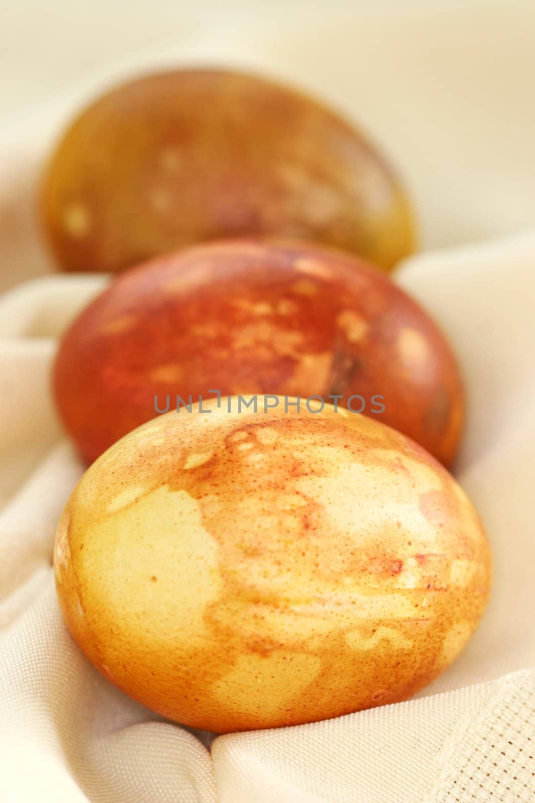 Naturally dyed easter eggs - the eggs are colored with various leaves and flowers such as roses