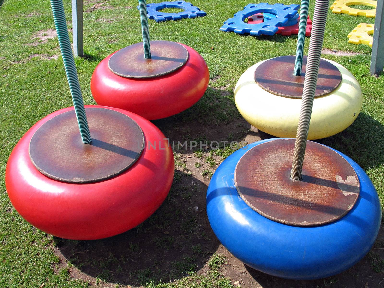 Modern design colorful swings in a playground