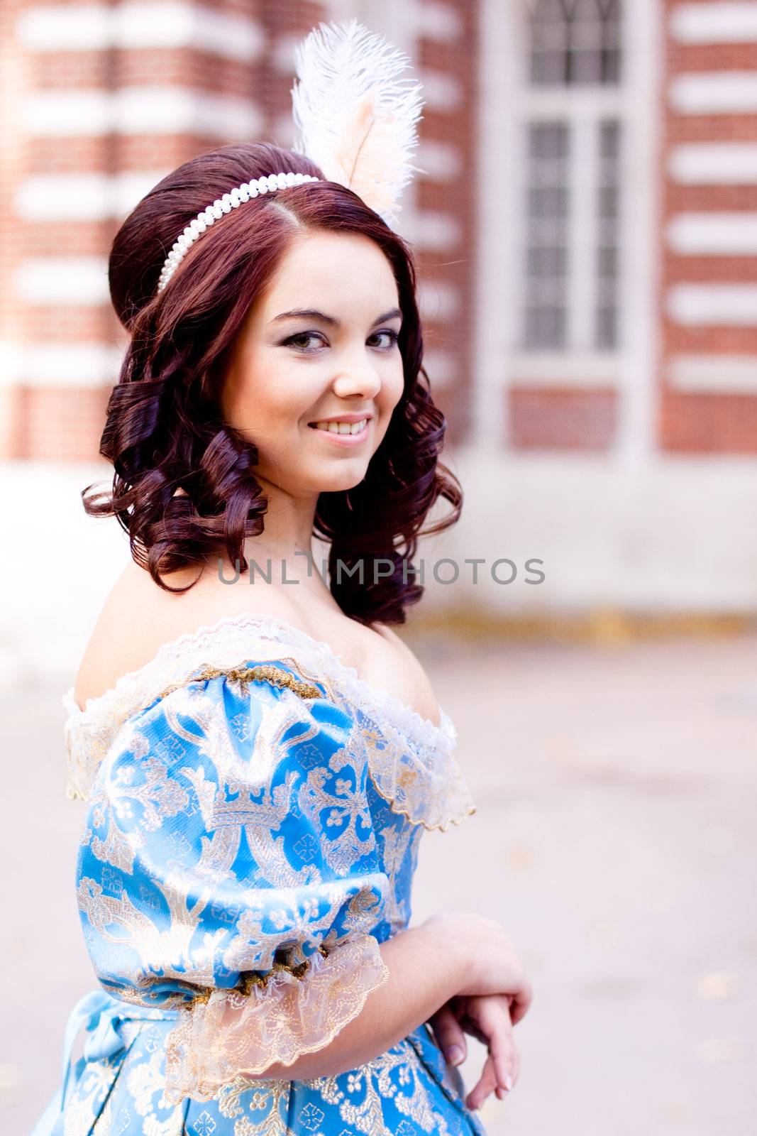 Portrait of lady in blue baroque dress
