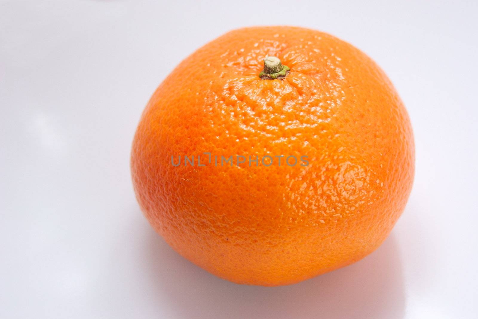fresh orange by leafy