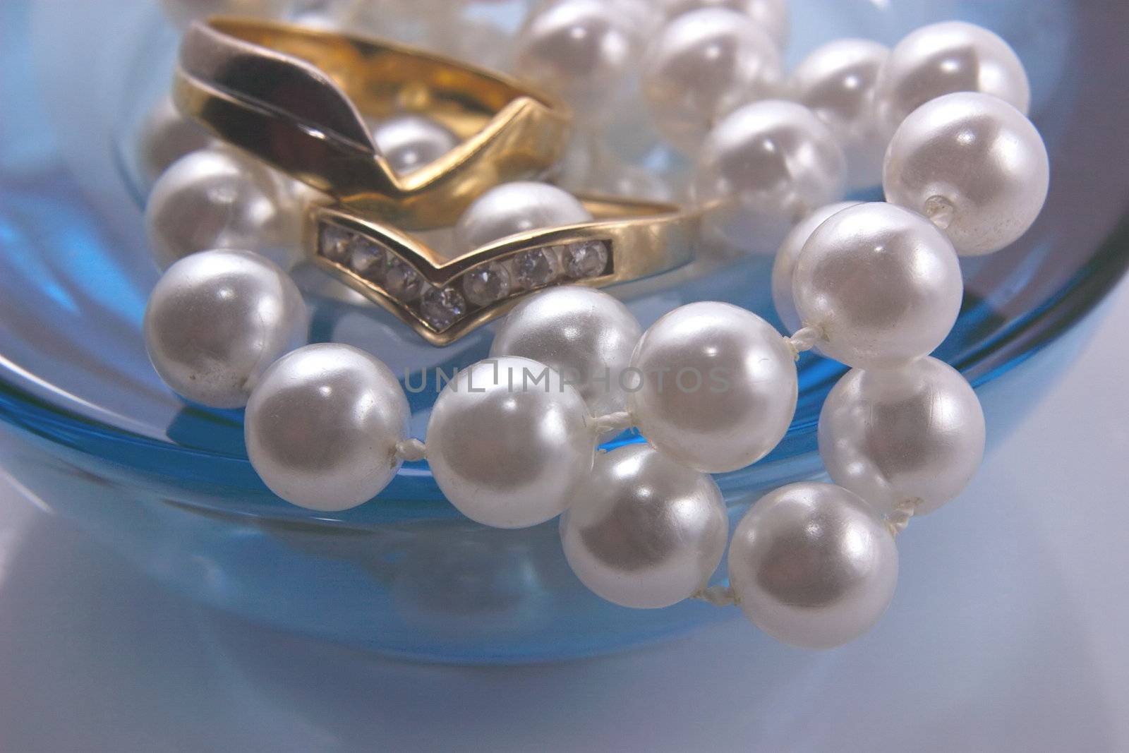 rings and pearls for the bride