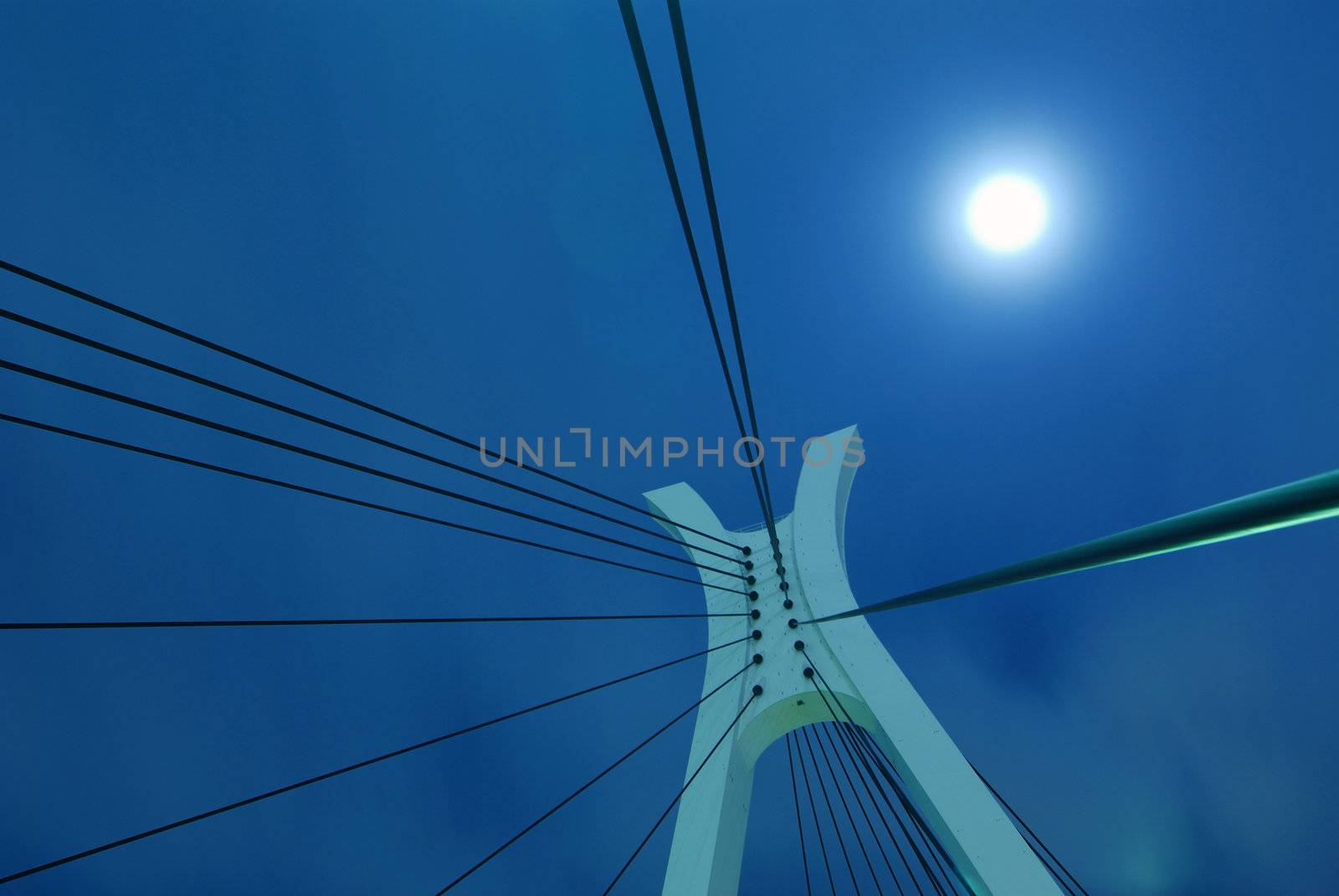 abstract suspension bridge elements on the night city sky with full moon