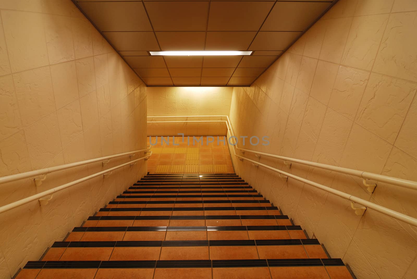 light corridor with stairs going down