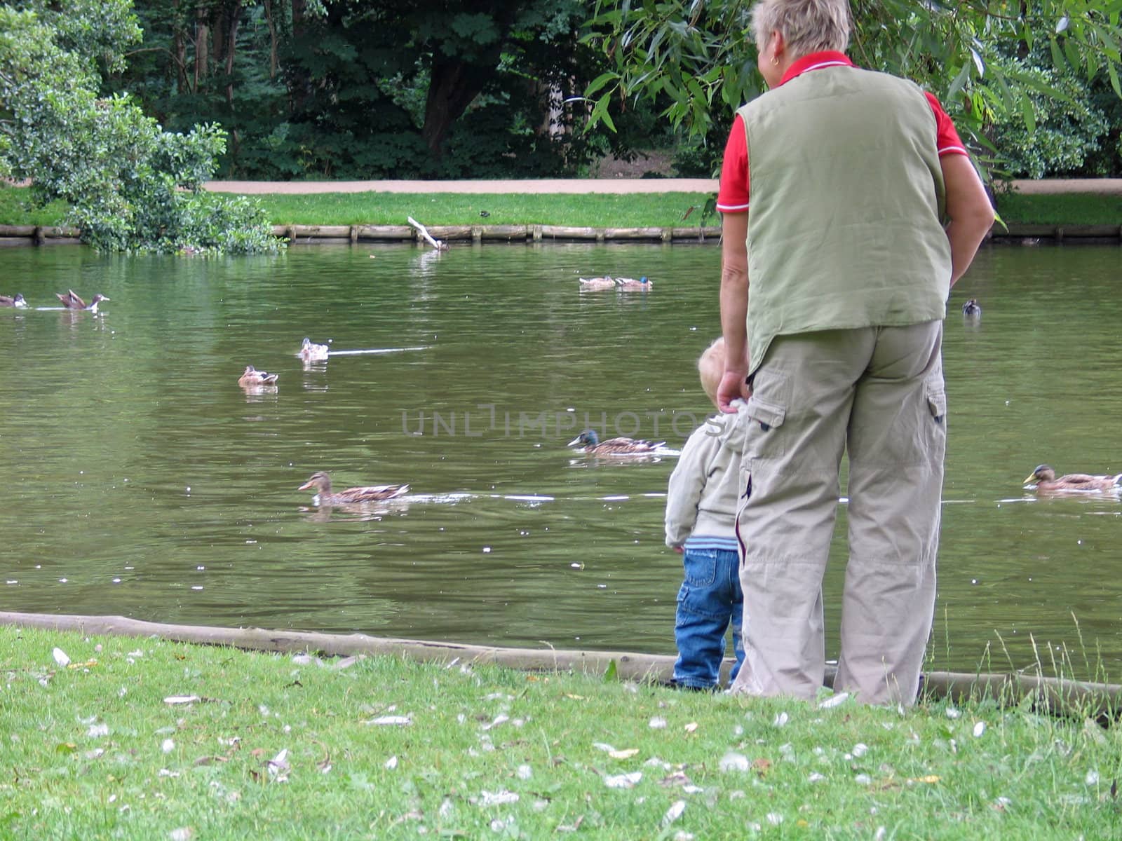 Quality time and fun together by a lake in a park