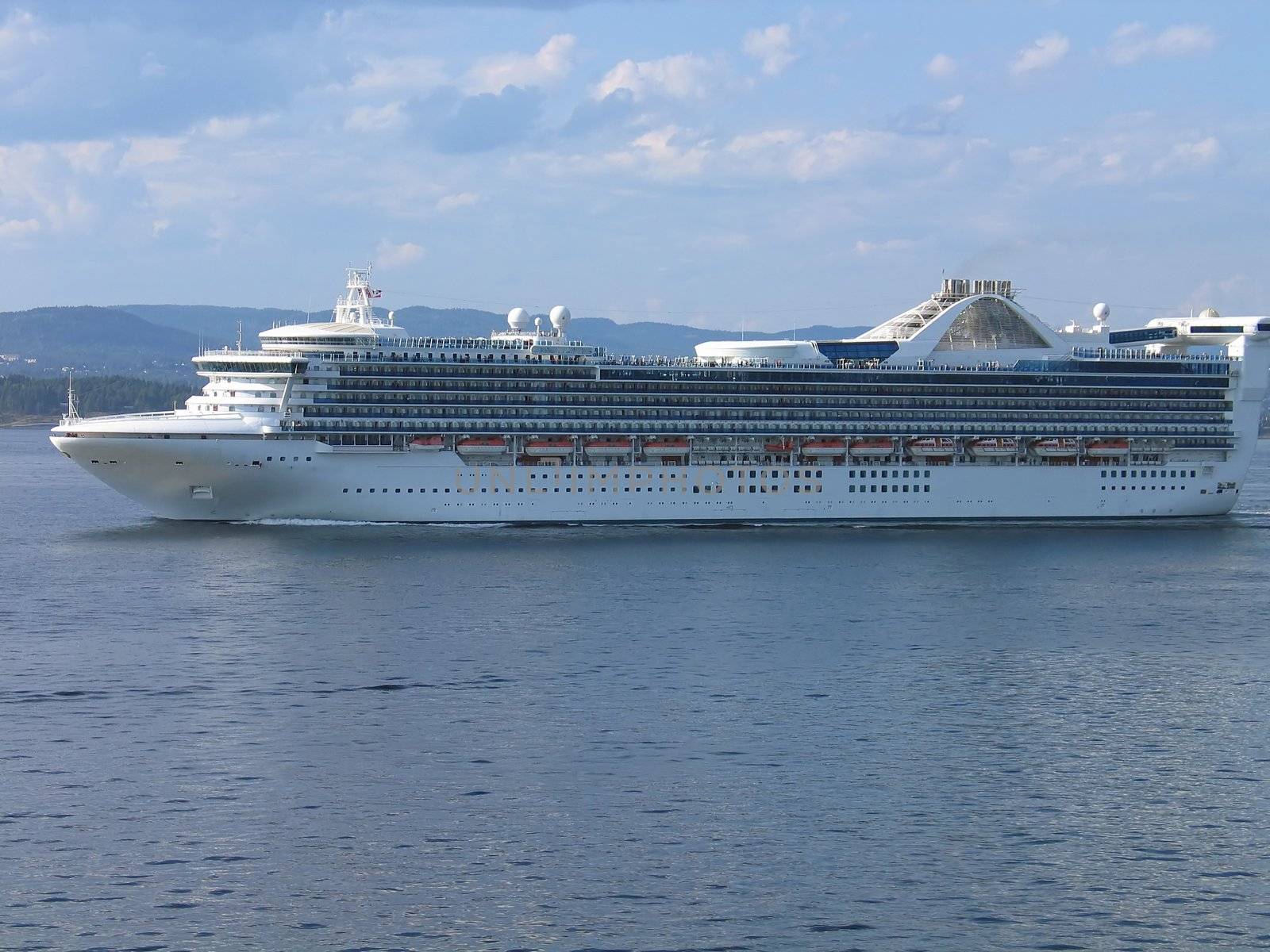 Big cruise ships sailing between the fjords in Norway