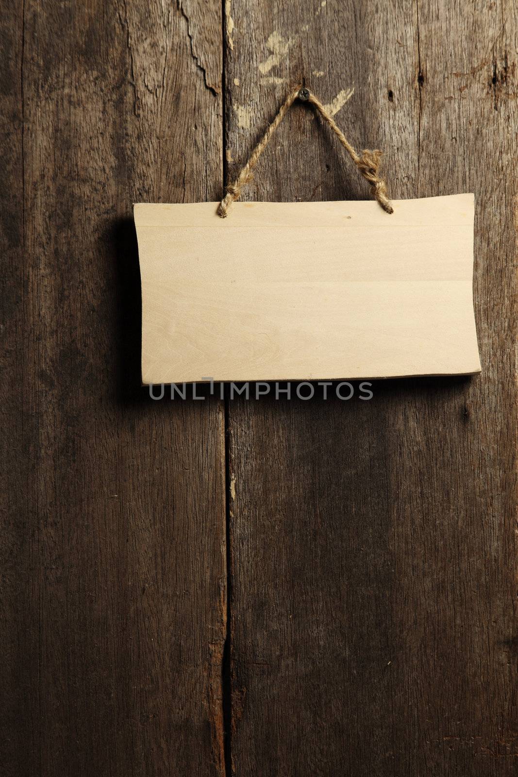 wooden board hanging on the wall