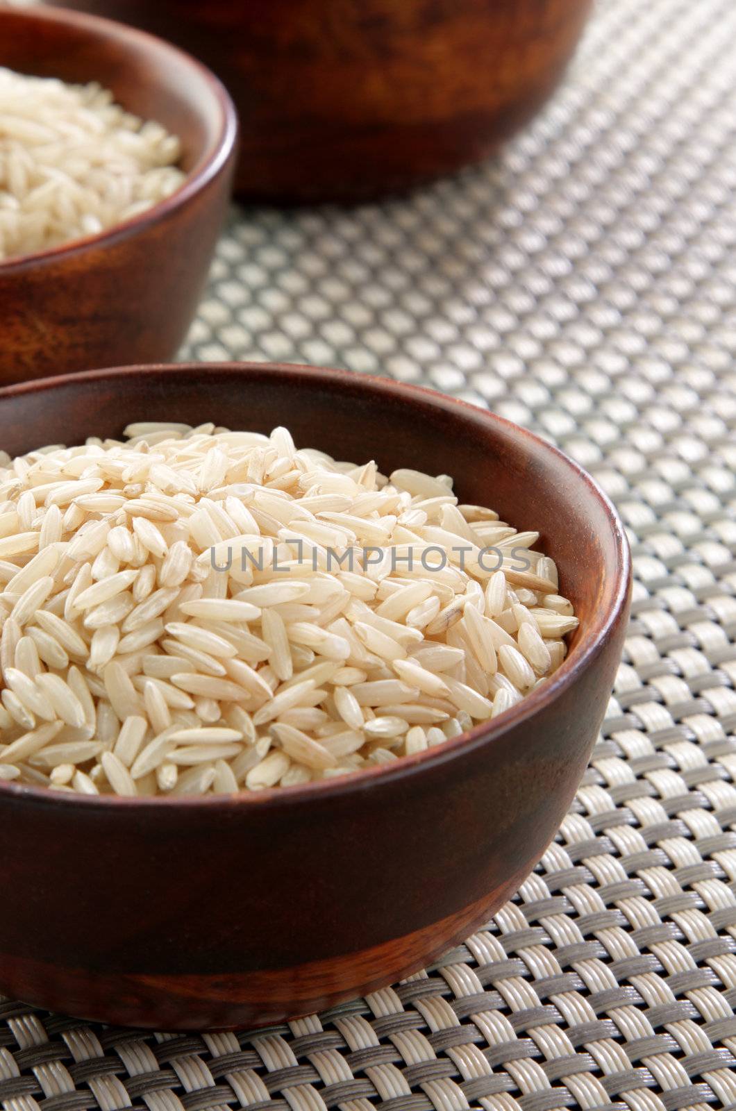 Several bowls of healthy organic basmati rice.