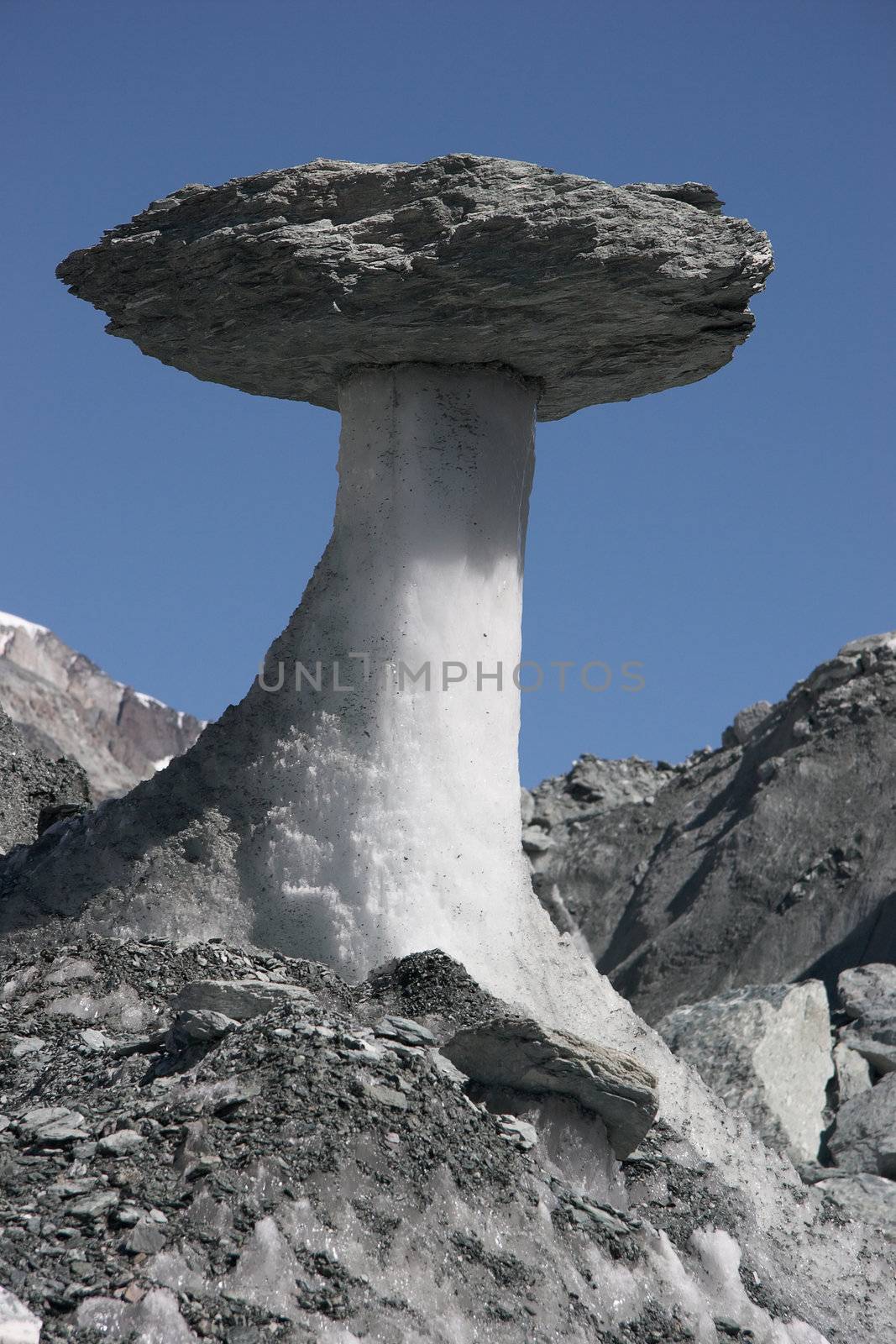 "Stone mushroom" on a glacier (Pamir mountains)