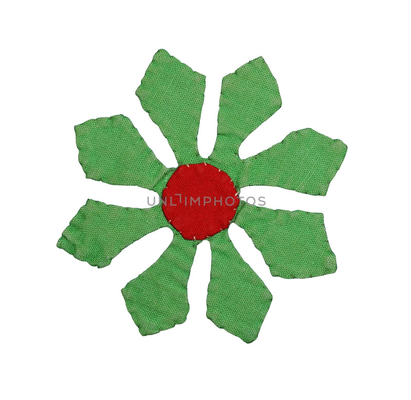 Handmade flower isolated on white with clipping path. This flower is made out of fabric and sewed together. Perfect for that unique summer look in your designs.