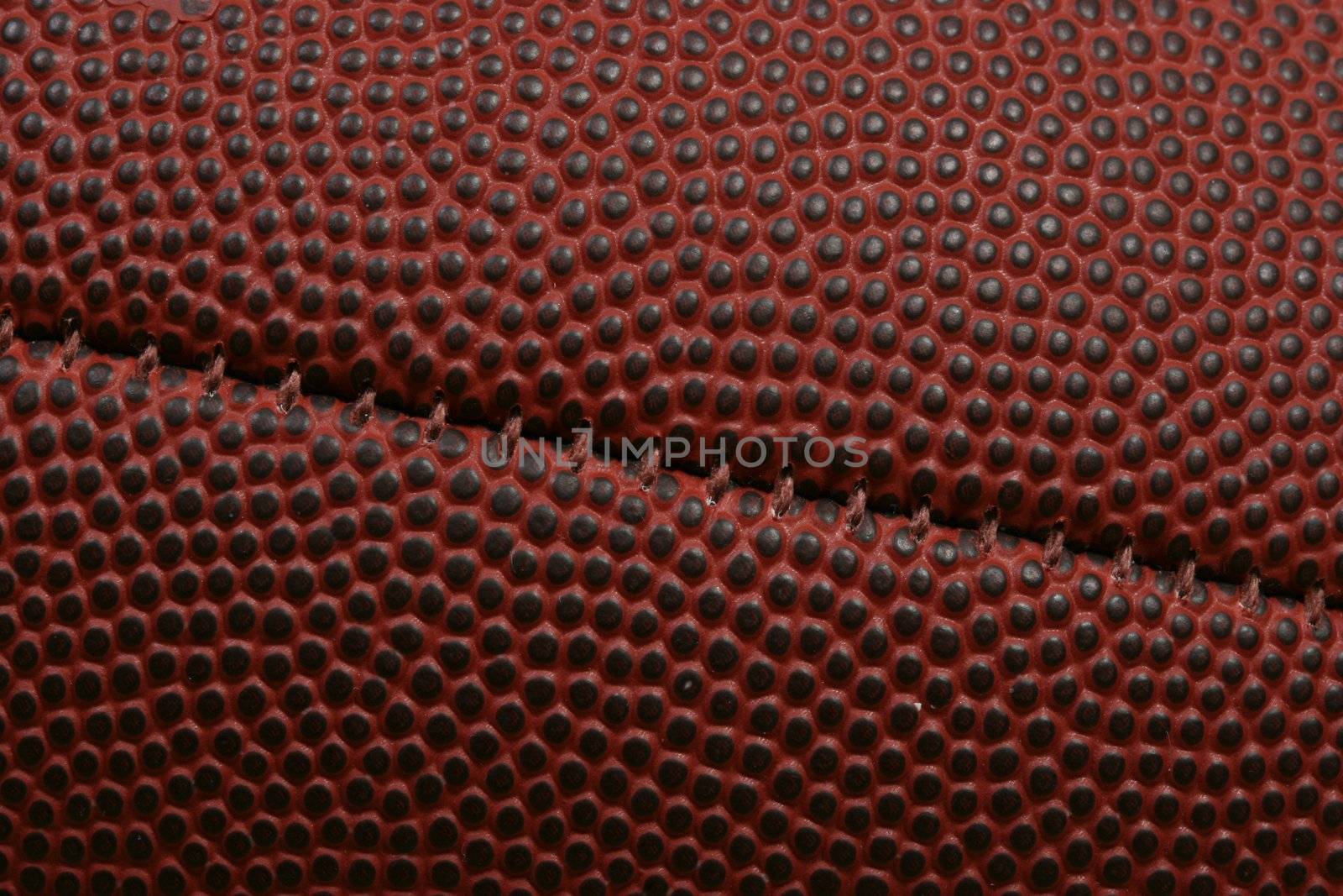 Extreme close-up of football with seam