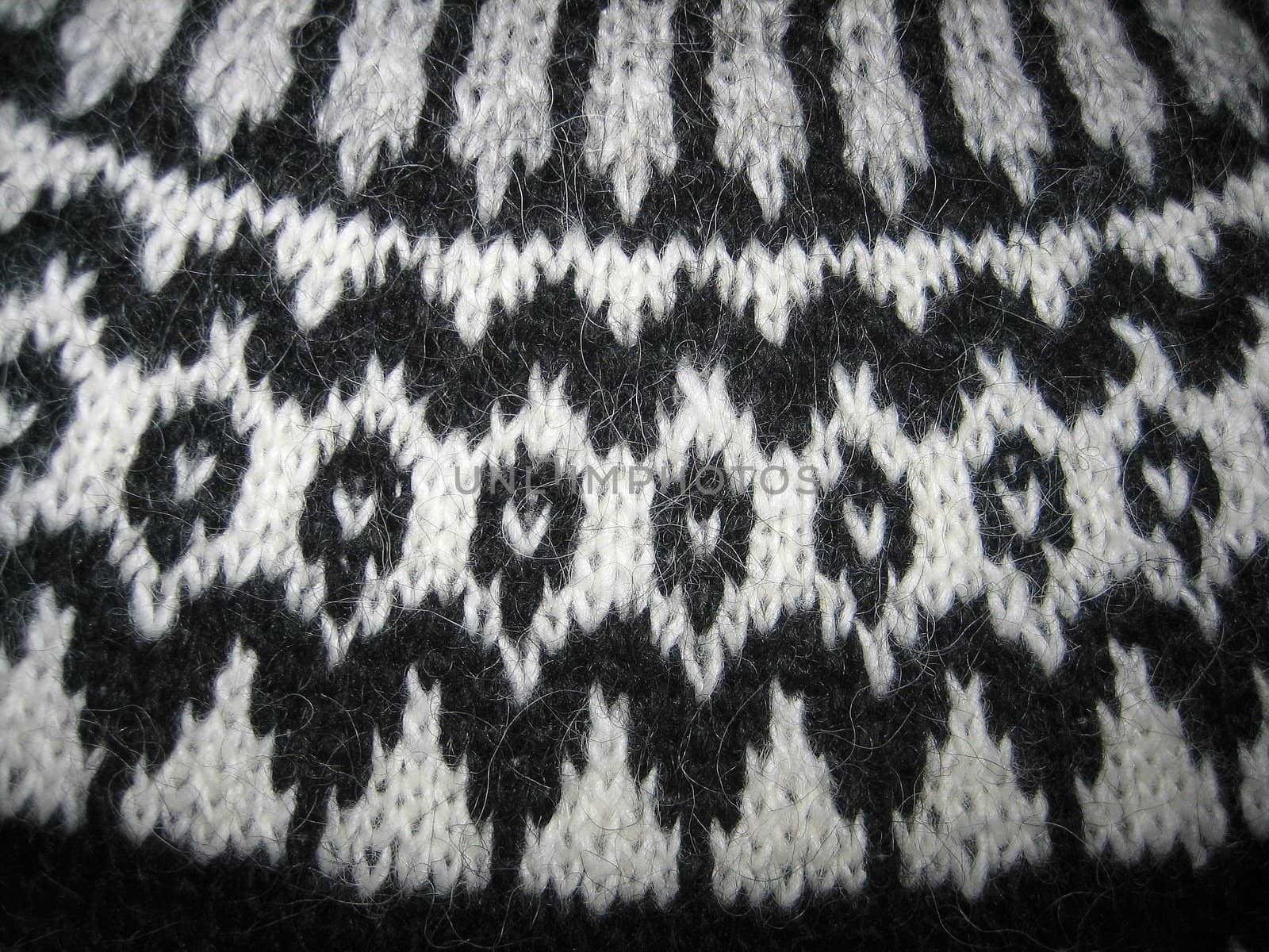 Macro of a handmade wool sweater with old pattern