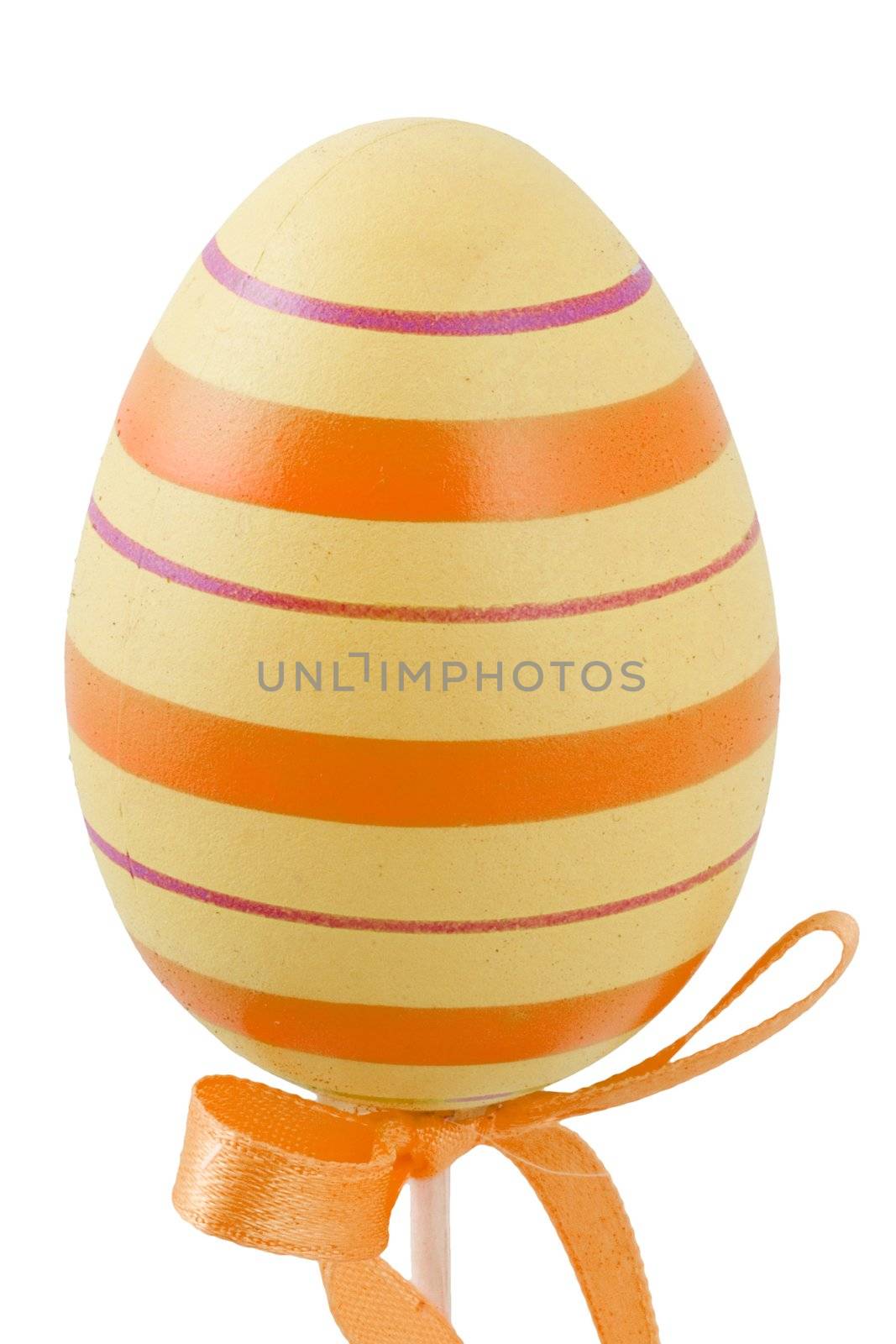 a yellow and orange easter egg isolated on the white background