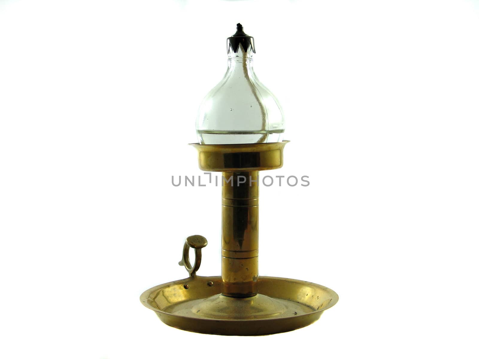 Antique copper oil lamp isolated on white