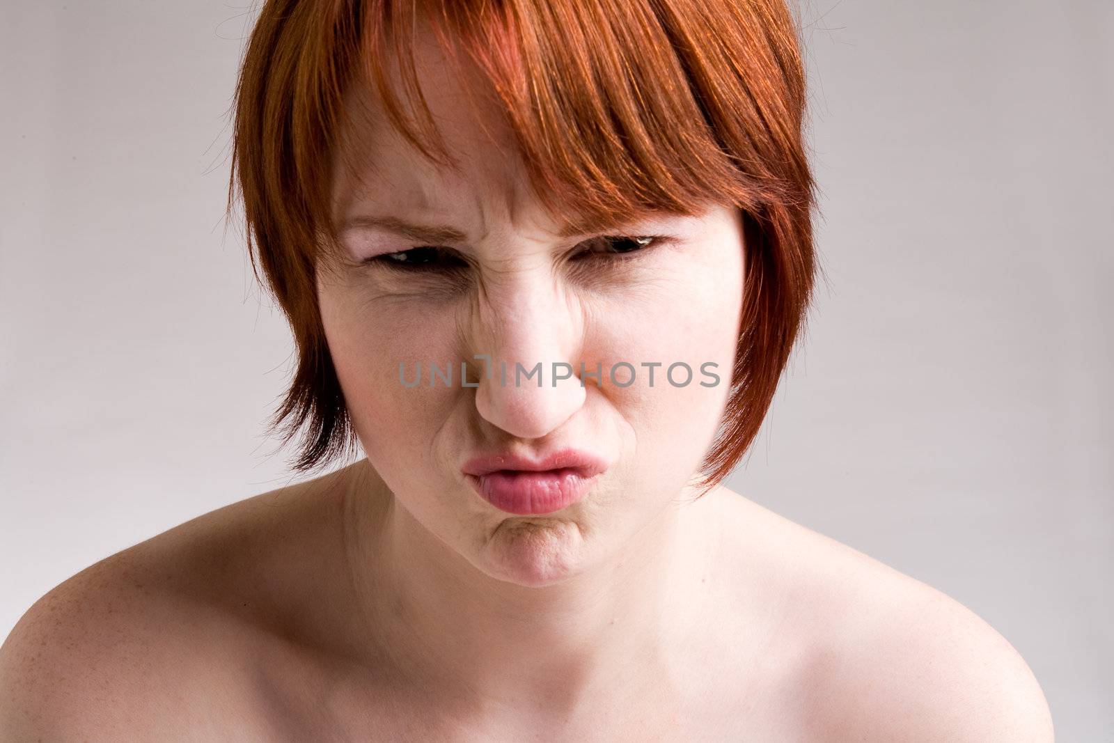 Red haired girl with emotive faces and expressions