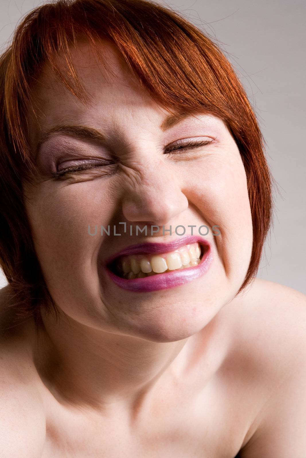 Red haired girl with emotive faces and expressions