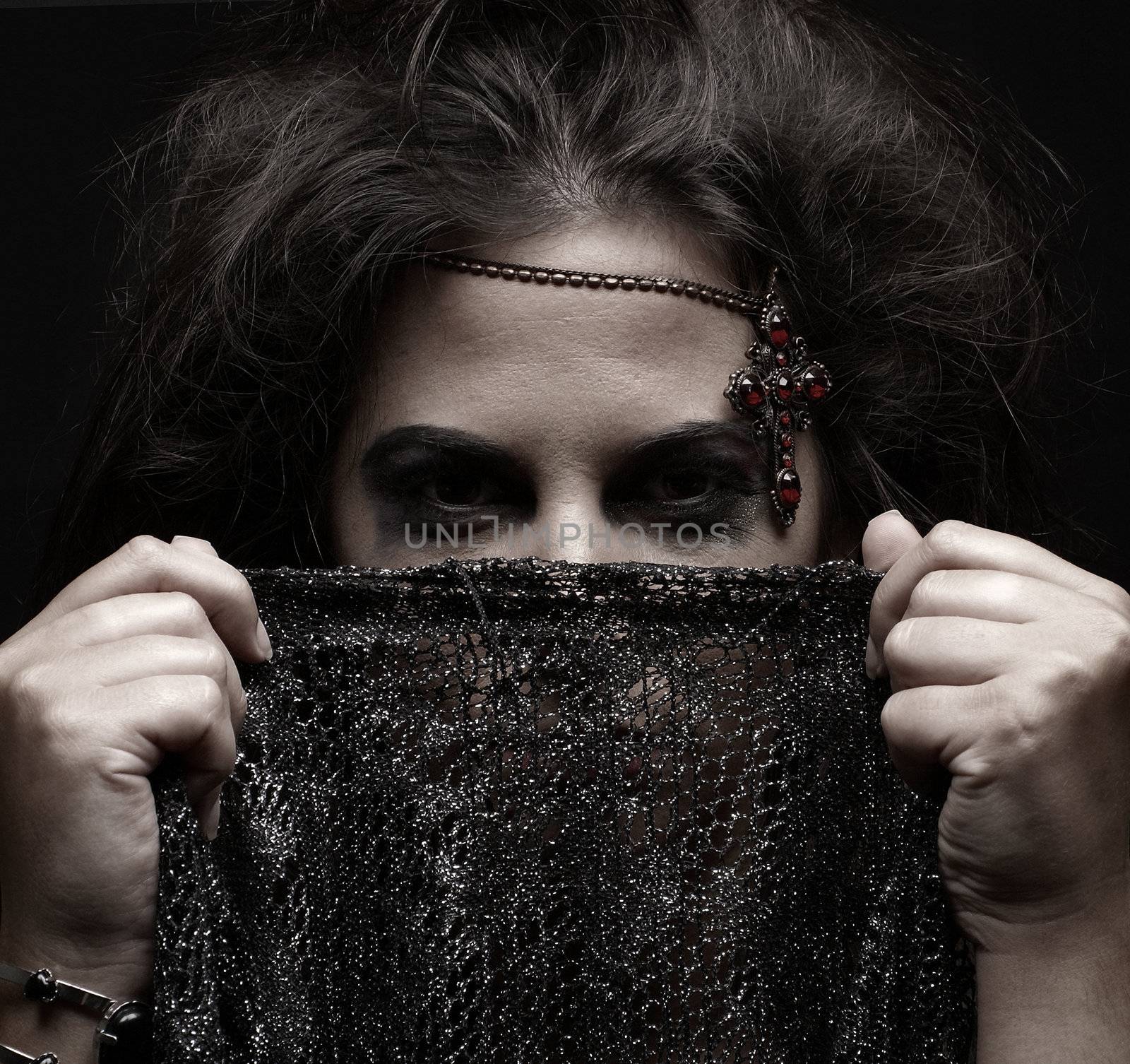 Portrait of arabic woman over dark background              