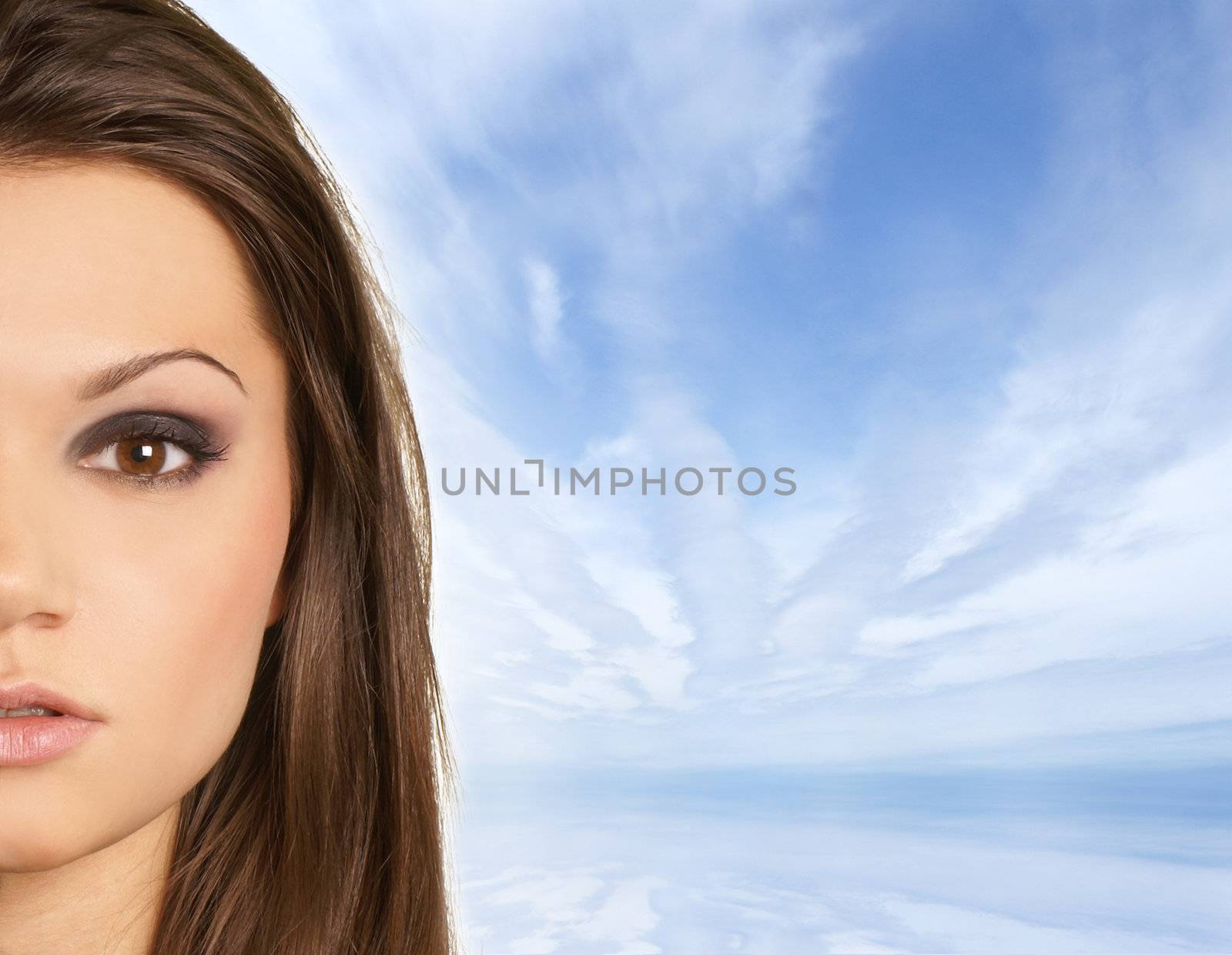Attractive latino woman over sky with a lot of copy-space     