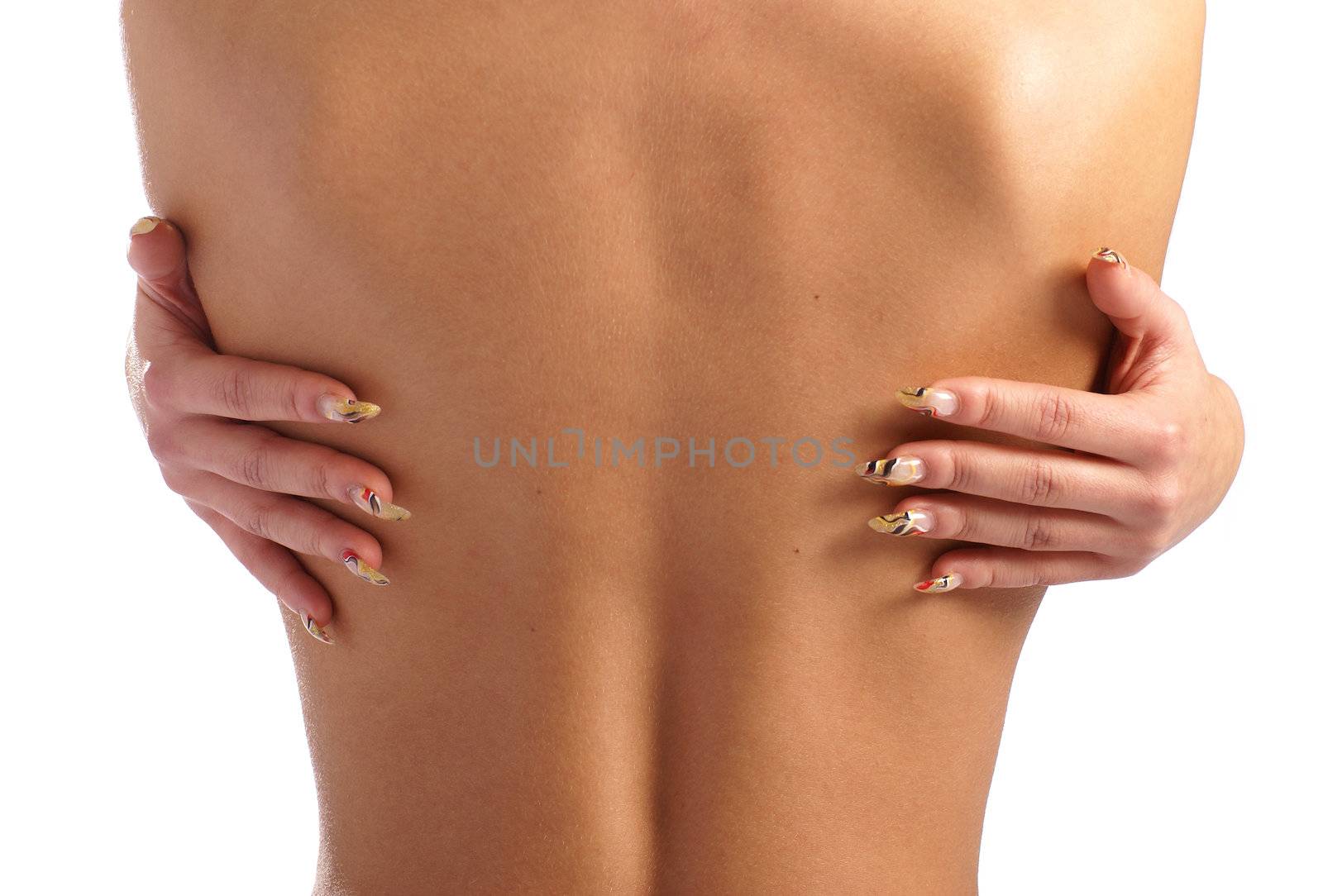 Naked female back and fingers with bright manicure isolated on white              