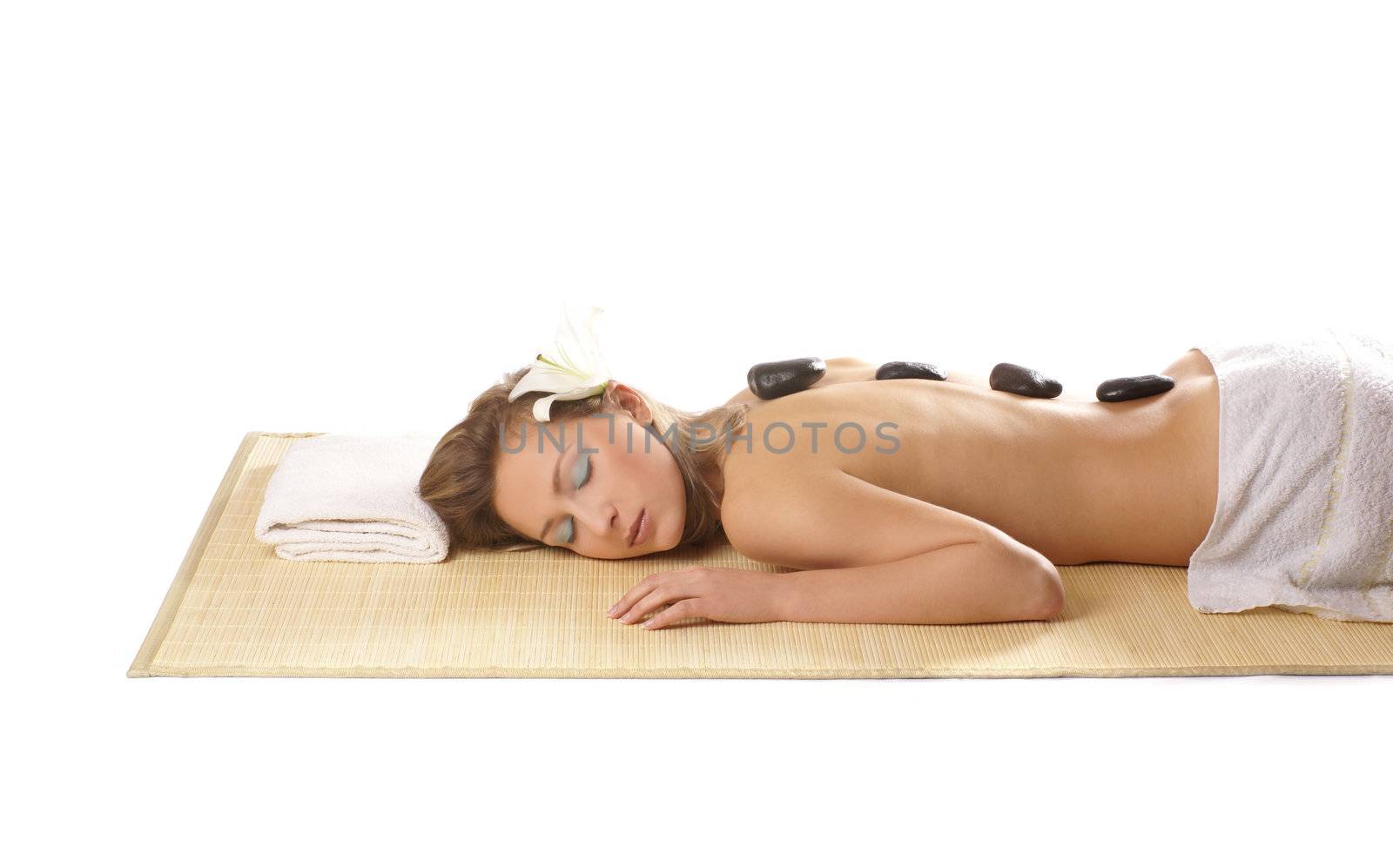 Attractive woman getting spa treatment isolated on white