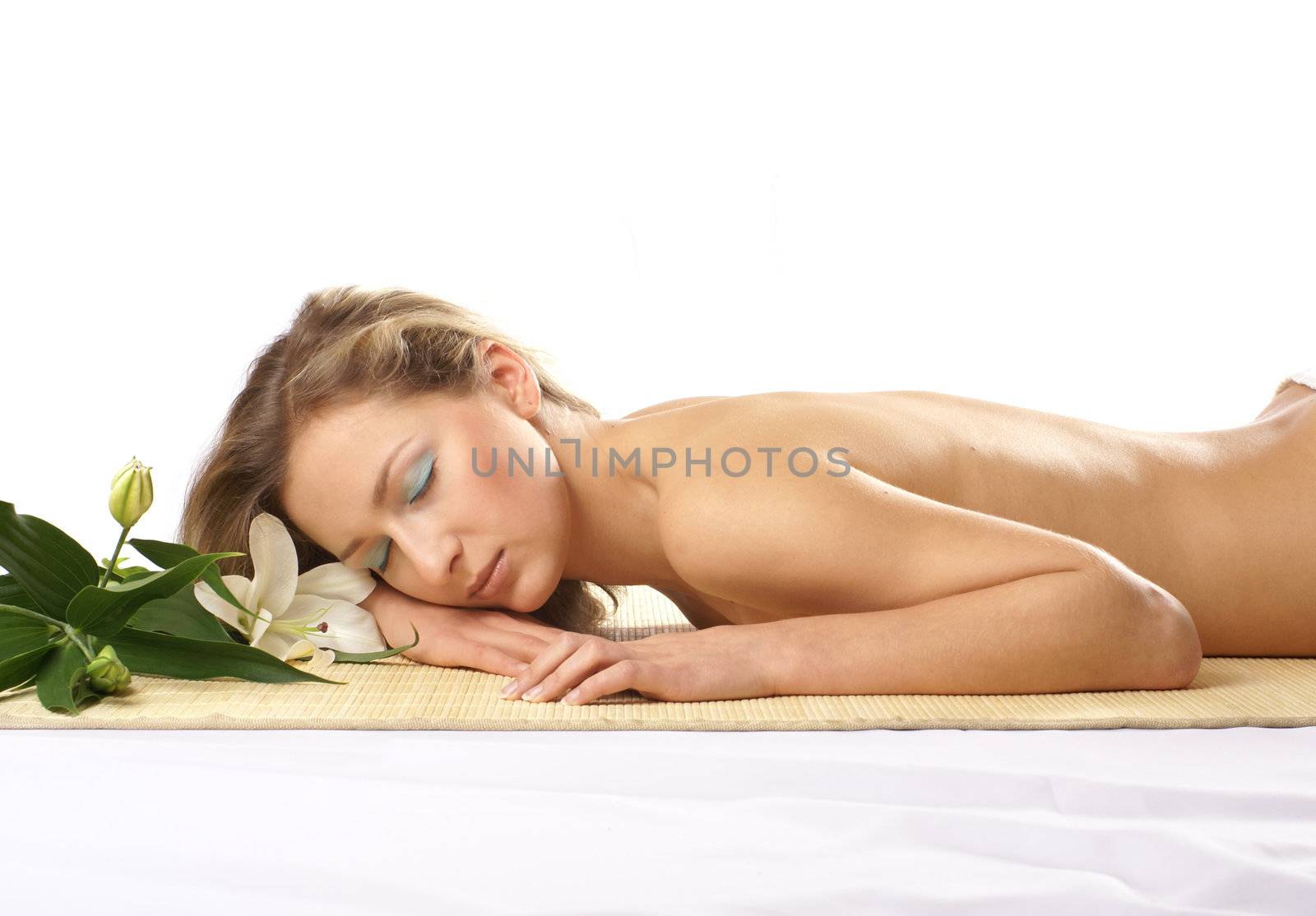 Attractive woman getting spa treatment isolated on white