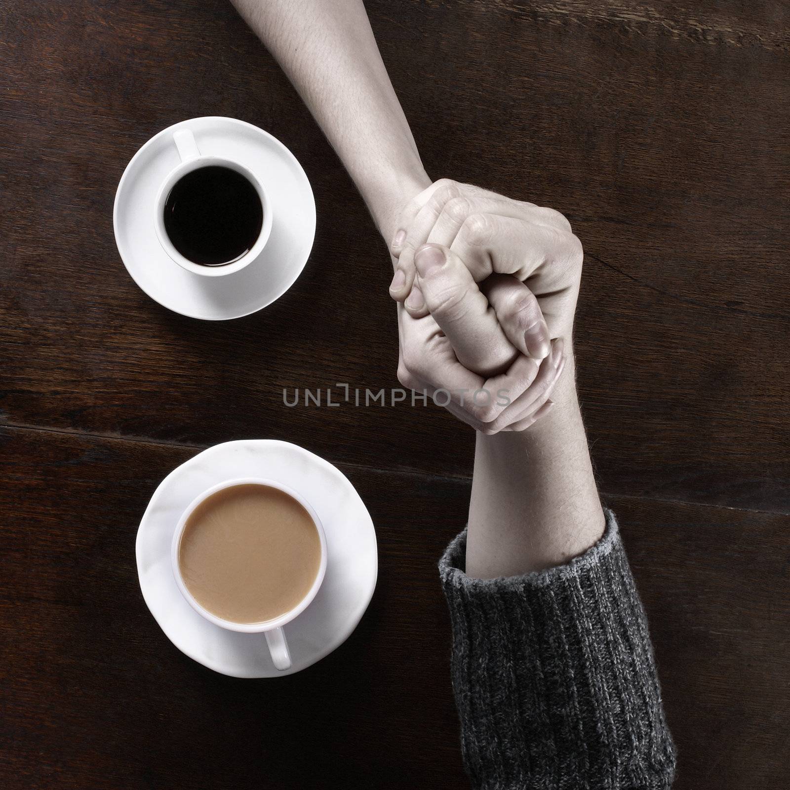 Concept of male and female hands, love and coffee              