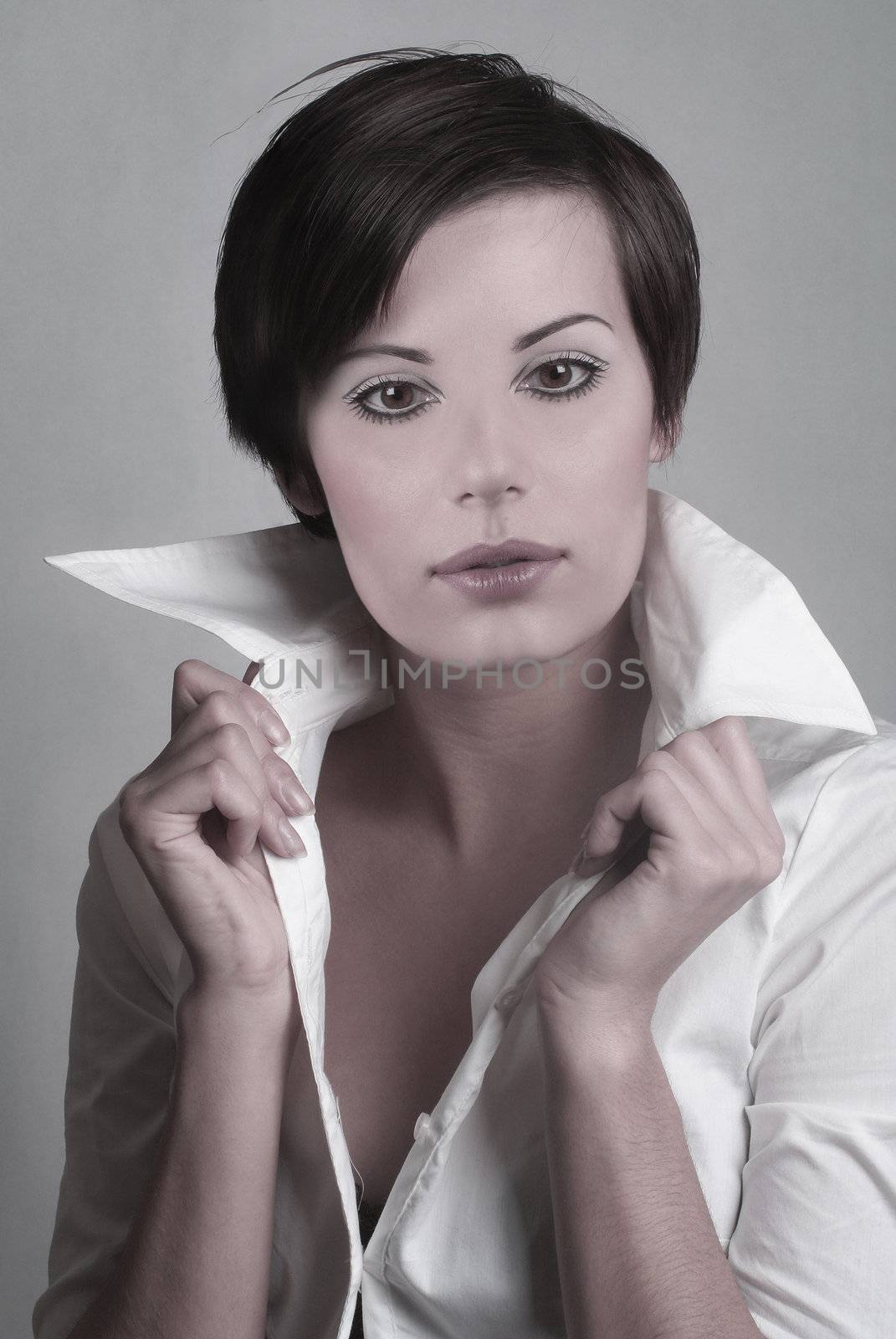 Composite mask of beautiful woman over grey background