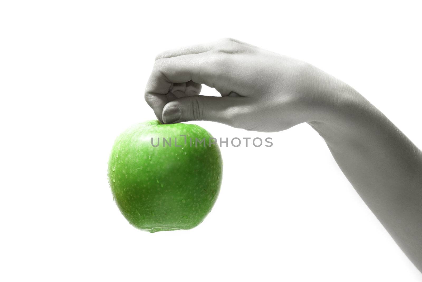 Tasty sweet apple in graceful woman's hand     