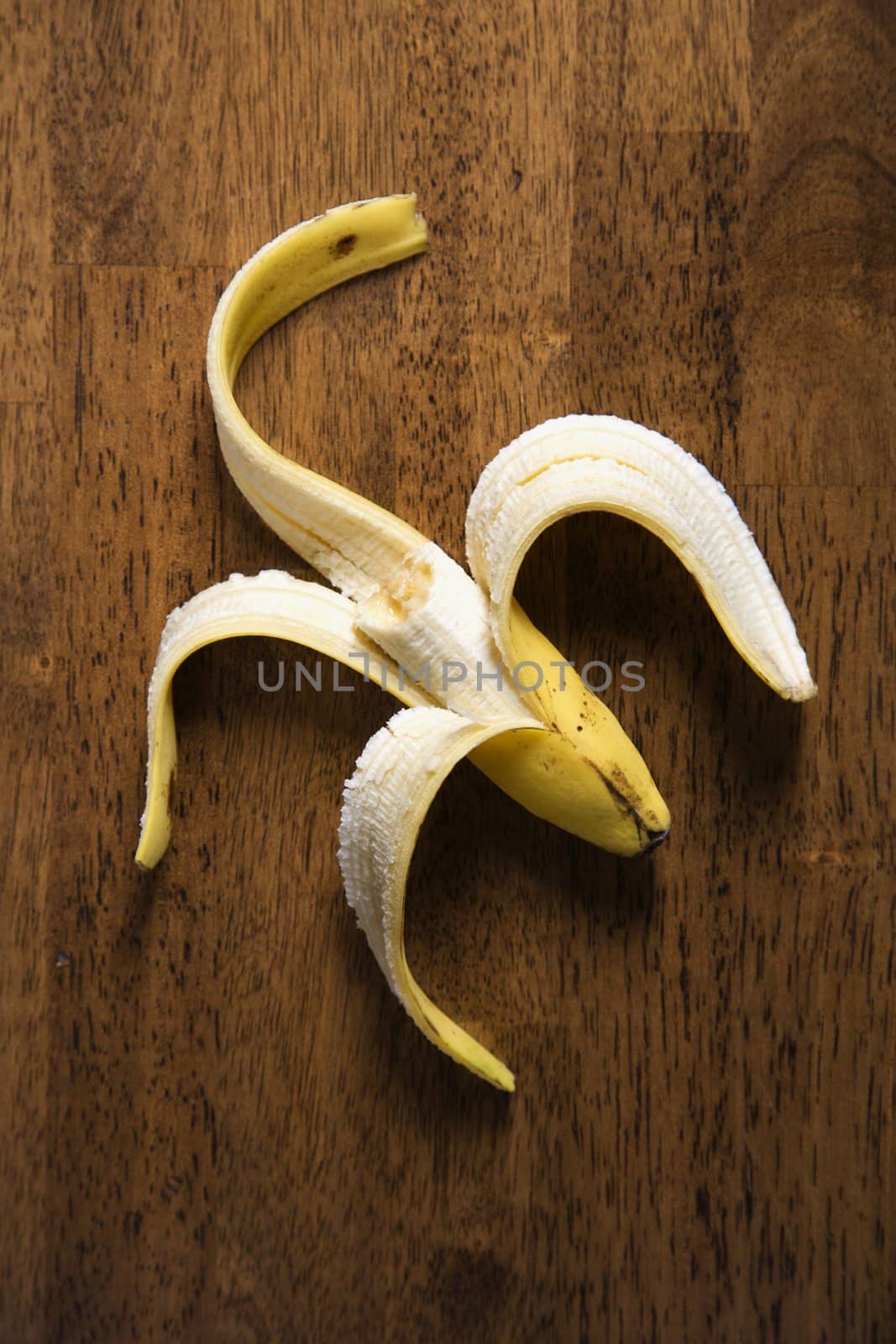 Close up still life of half eaten banana.