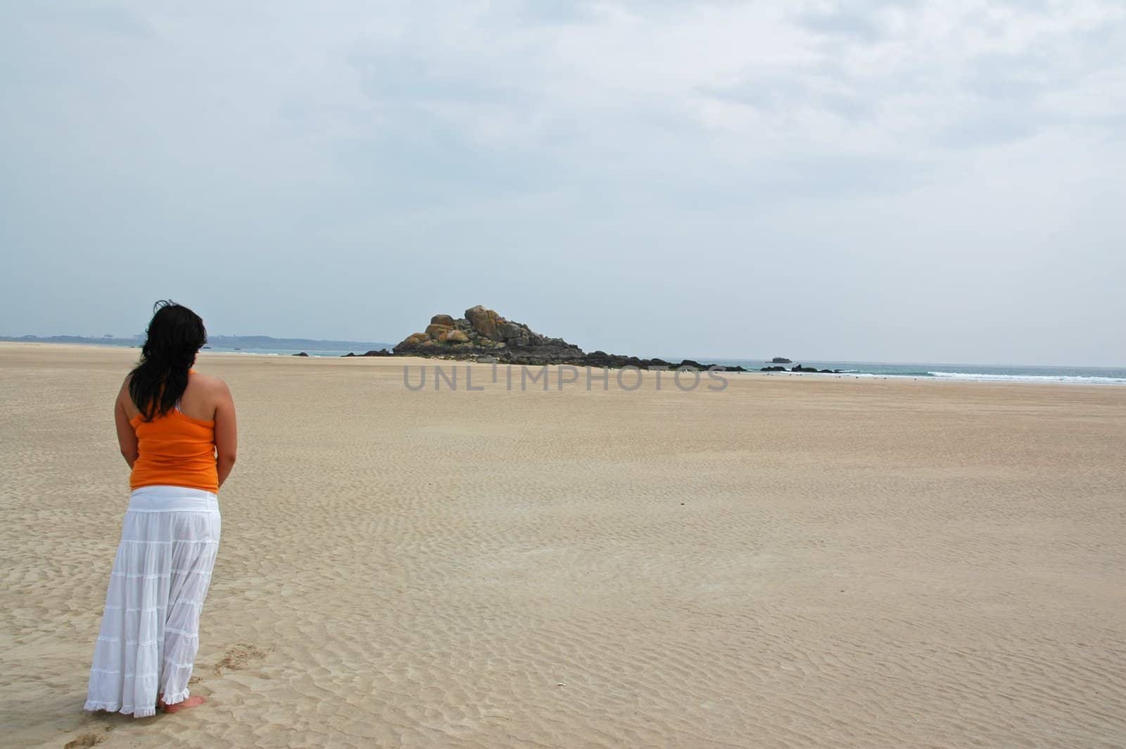 young girl walking on Corrubedo dunes, Galiza