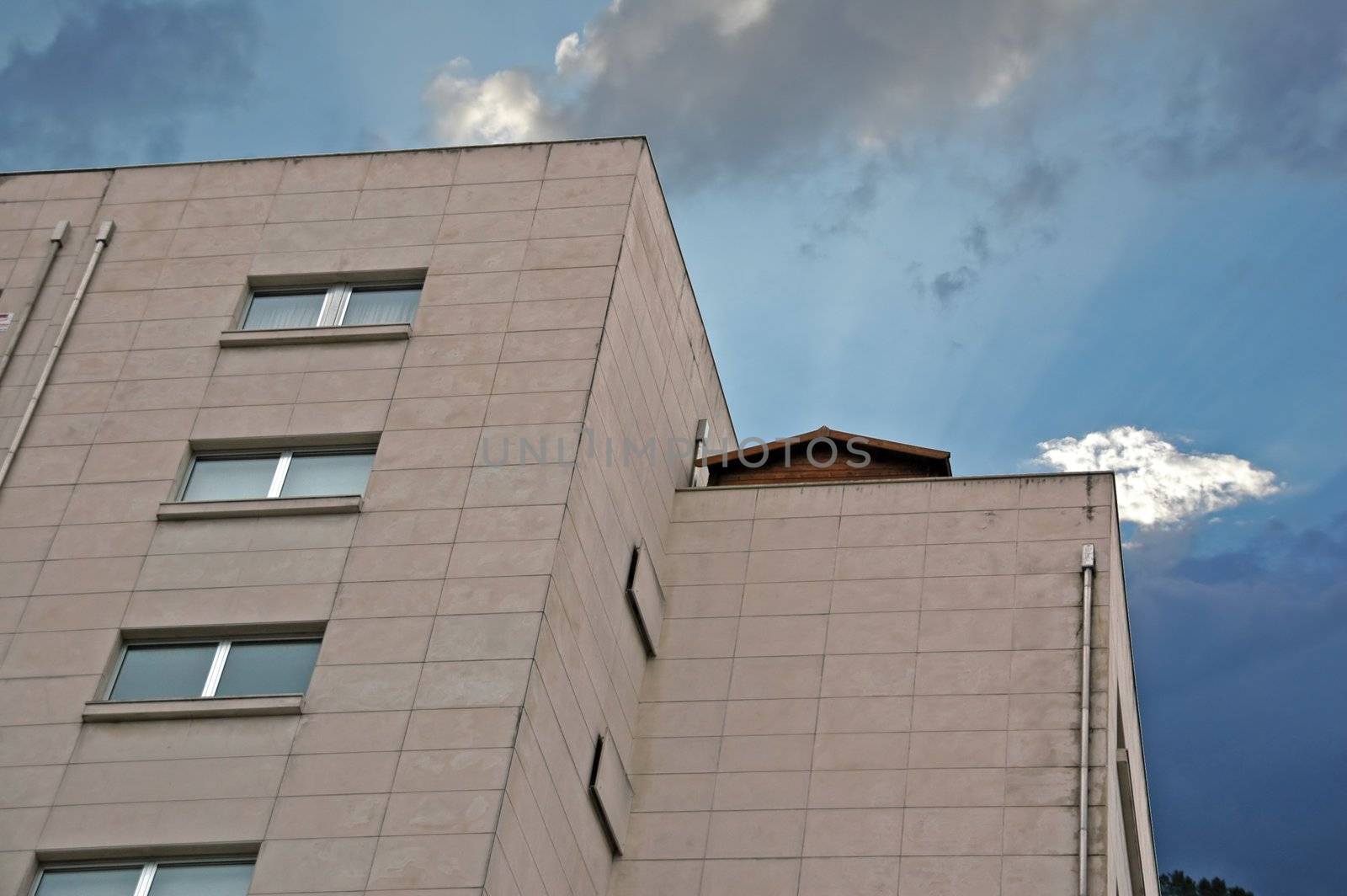 modern skyscraper with clouds