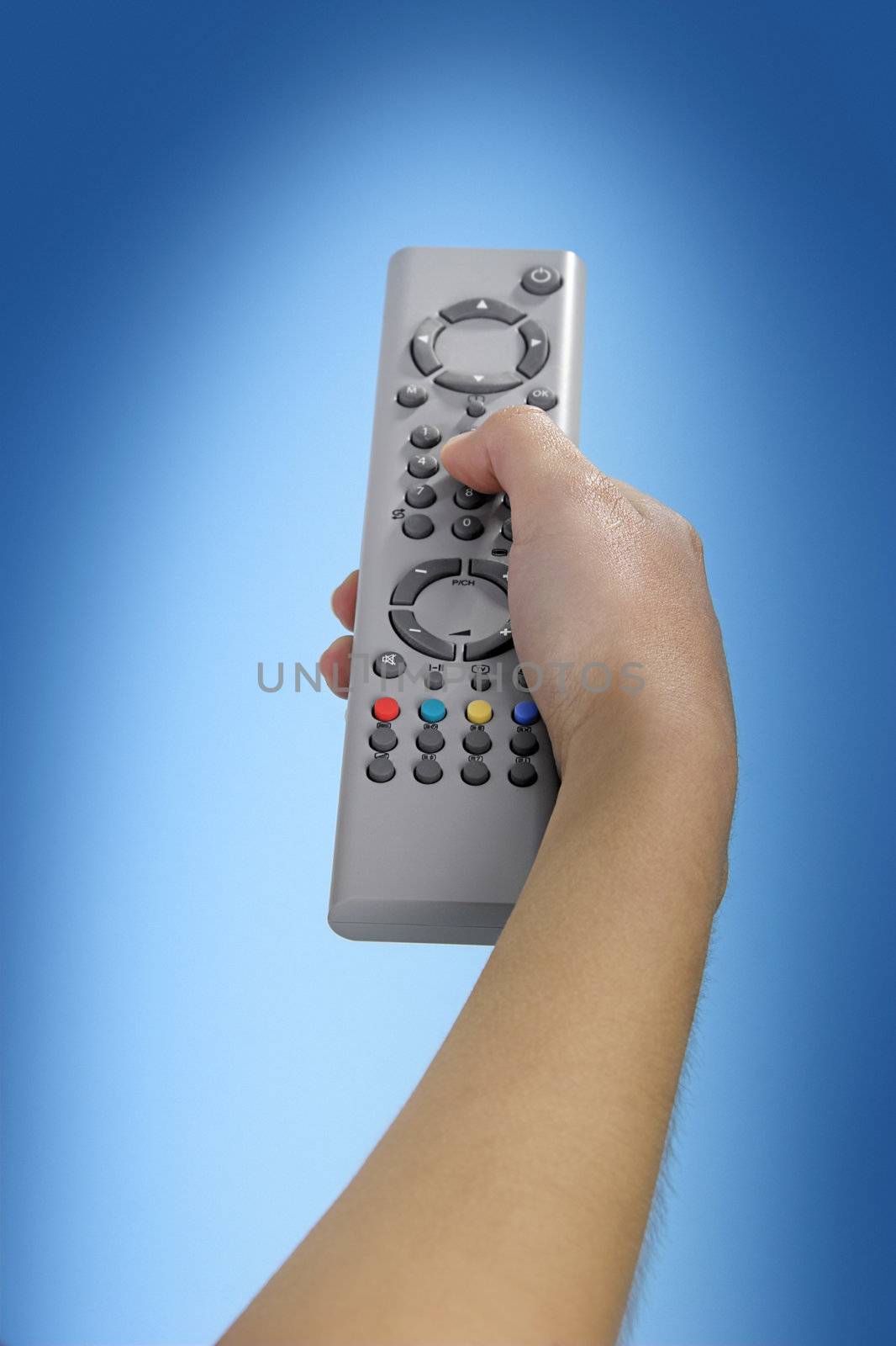 Human hand olding a tv remote control