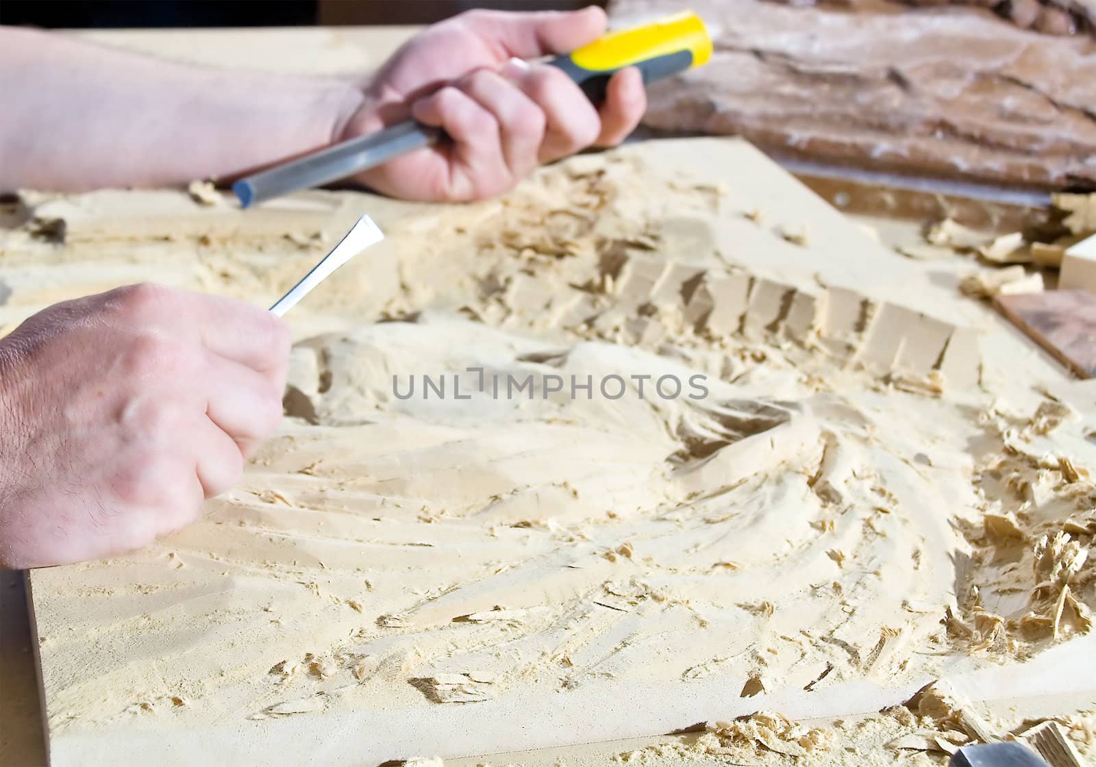 Hands of the carver