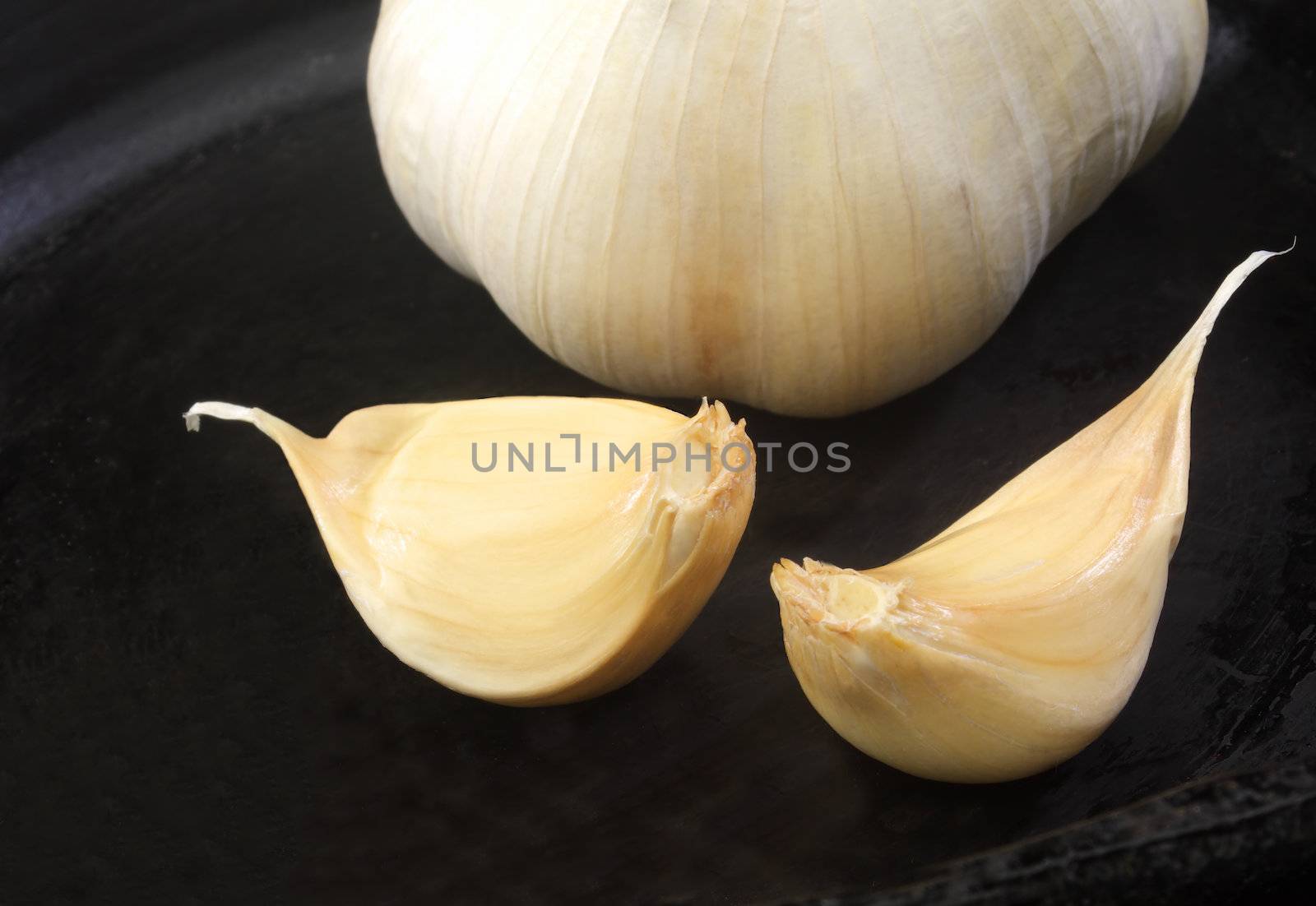 Garlic cloves  by carterphoto