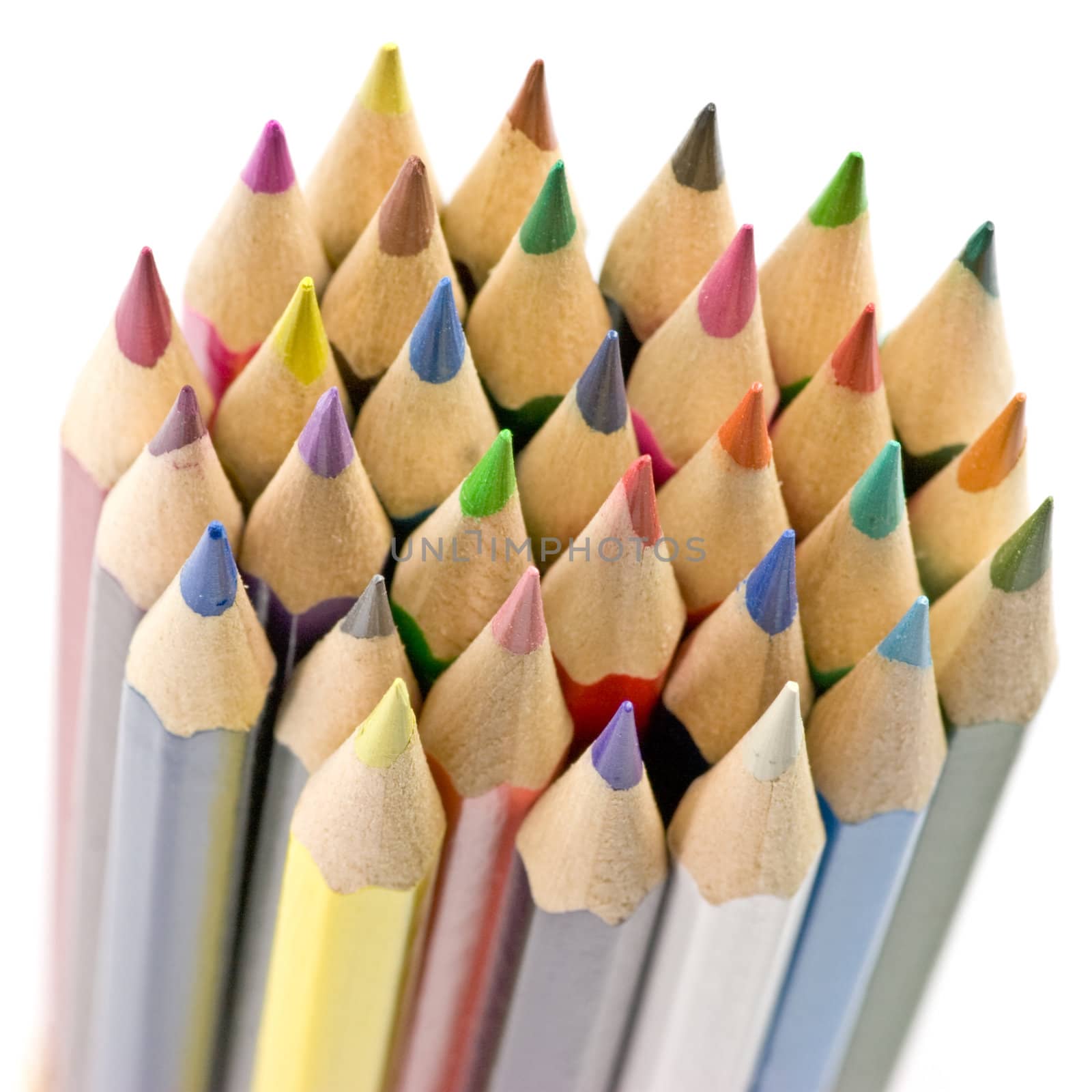 Stack of colored hexagon shaped pencils macro